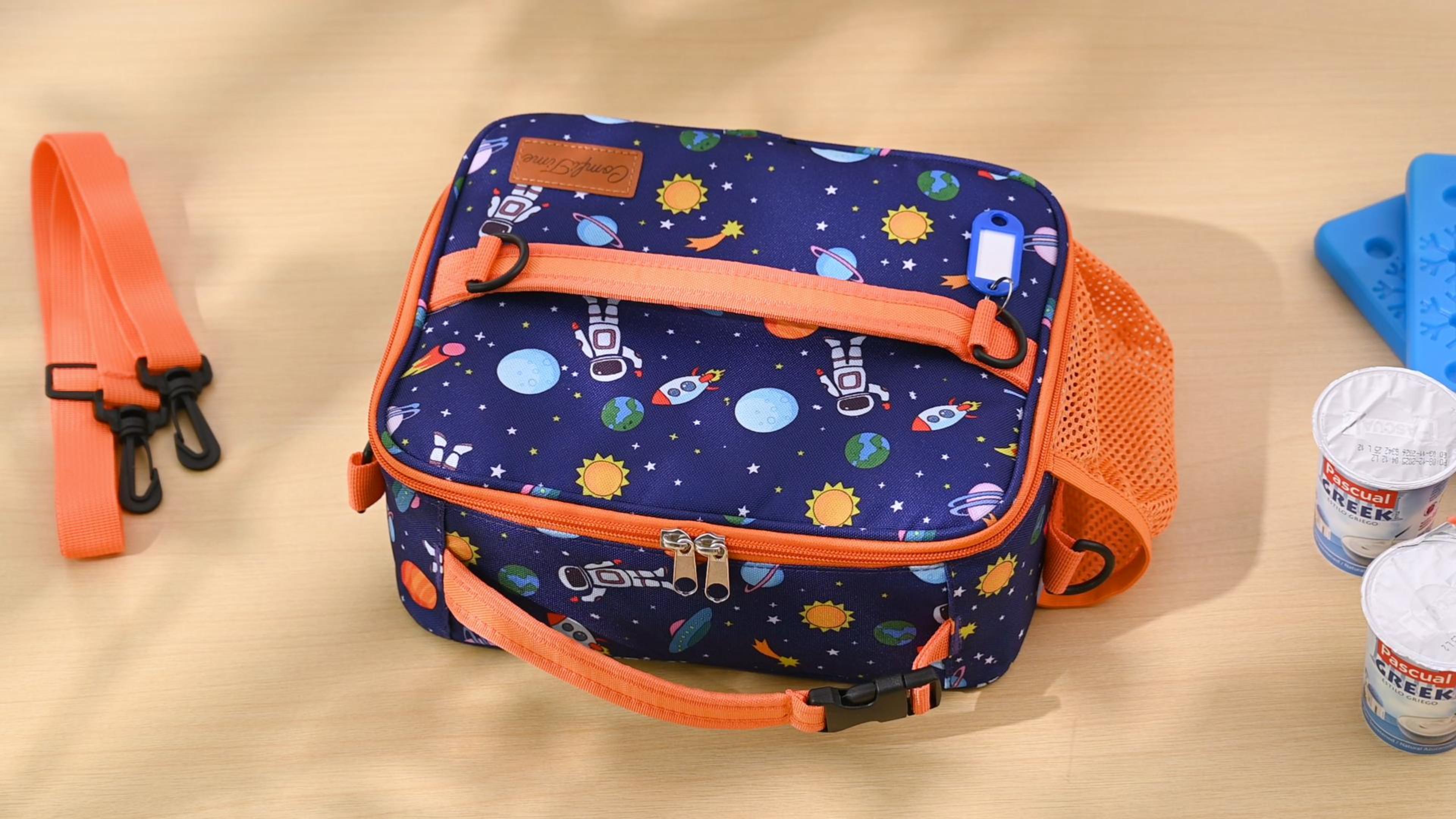 thumbnail video image 2 of ComfiTime Lunch Bag for Kids – Insulated Lunch Box for Girls and Boys, Cute Reusable Cooler Bag with Zipper Pockets, Bottle Holder, Padded Handles and Shoulder Strap (Blue Space), 2 of 10