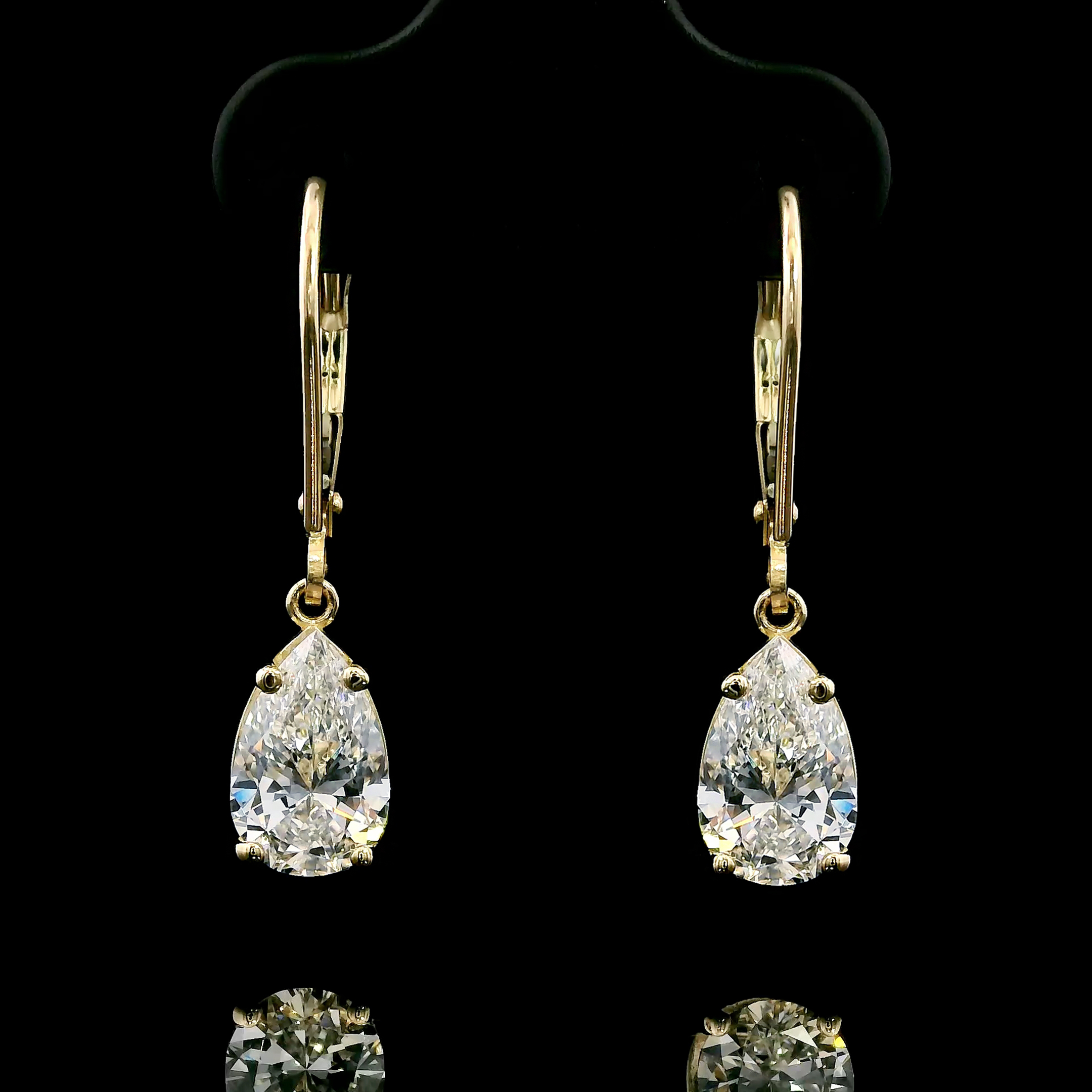 thumbnail video image 2 of Gem Stone King 14K Yellow Gold White Moissanite Earrings for Women | 2.64 Cttw | Gemstone Birthstone | Pear Shape 9X6MM, 2 of 8
