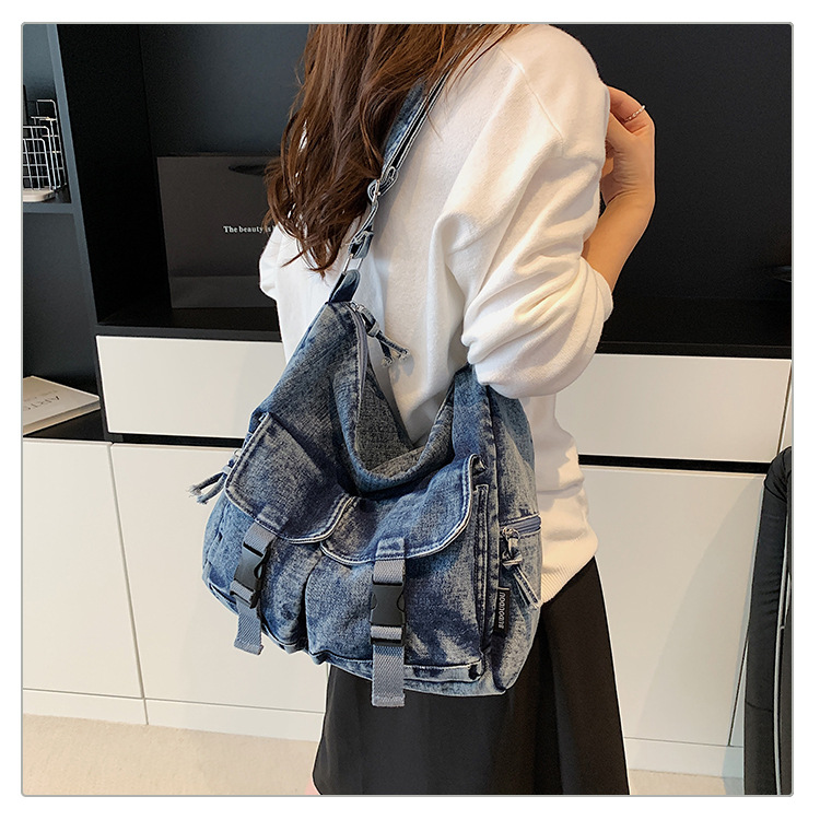 thumbnail video image 2 of Sunyuer Women Vintage Washed Denim Hobo Bag, Large Capacity Casual Crossbody Shoulder Bag with Multi Pockets, Adjustable Strap Trendy Retro Denim Handbag for Daily School Travel, 2 of 8