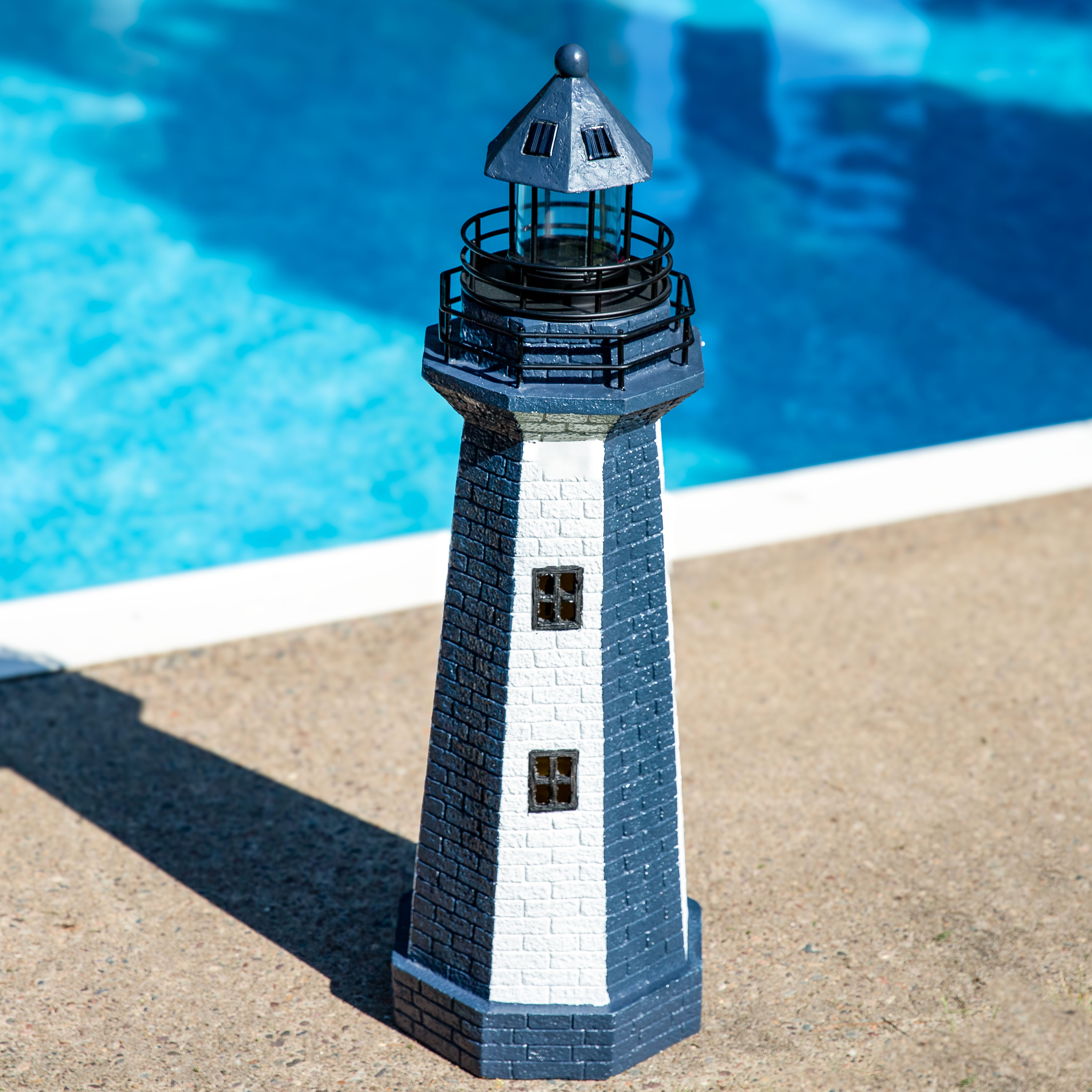 thumbnail video image 2 of Sunnydaze Vertical Stripe Resin Solar Resin Outdoor LED Lighthouse Statue, 2 of 14