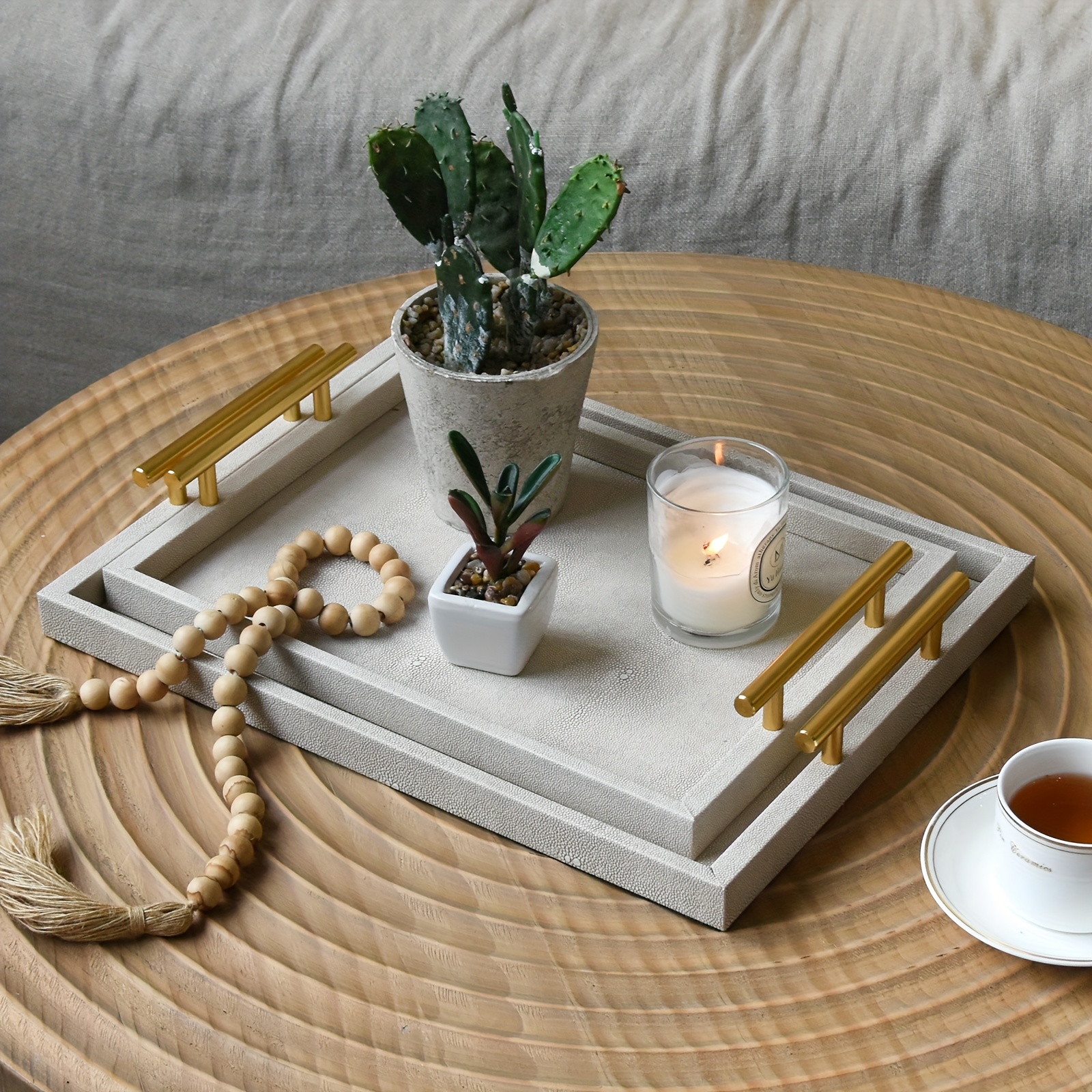 thumbnail video image 2 of MODE HOME Modern Decorative Tray Set of 2 Ivory Shagreen Leather and Wood Serving Tray with Gold Polished Metal Handles for Ottoman, Coffee Table, Bathroom and More, 2 of 10