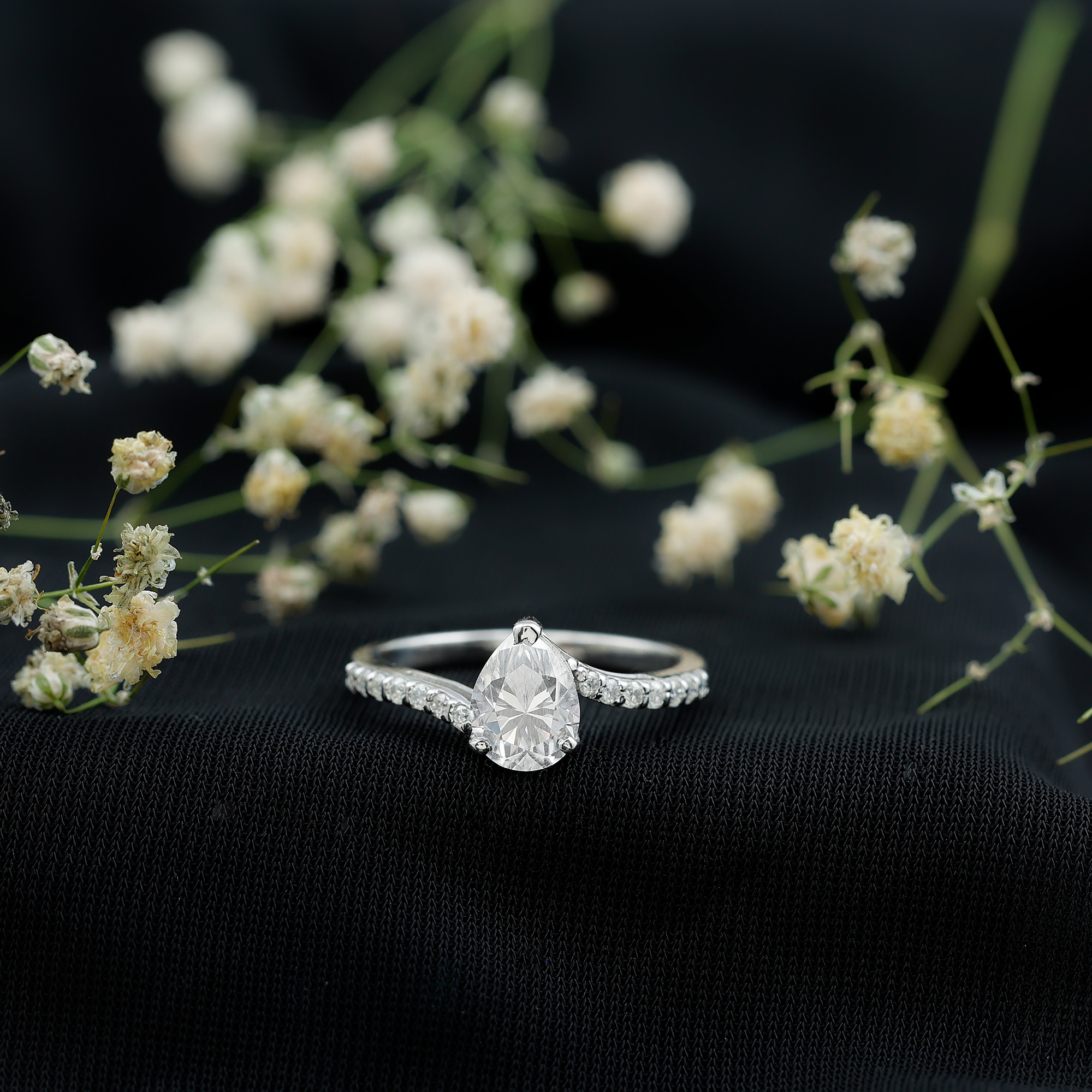 thumbnail video image 2 of Rosec Jewels Certified Solitaire Moissanite Pear Shaped Engagement Ring 1 Carat - 6X8 mm - Bypass Ring - D-VS1 Quality, 18K White Gold, US 7.00, 2 of 7
