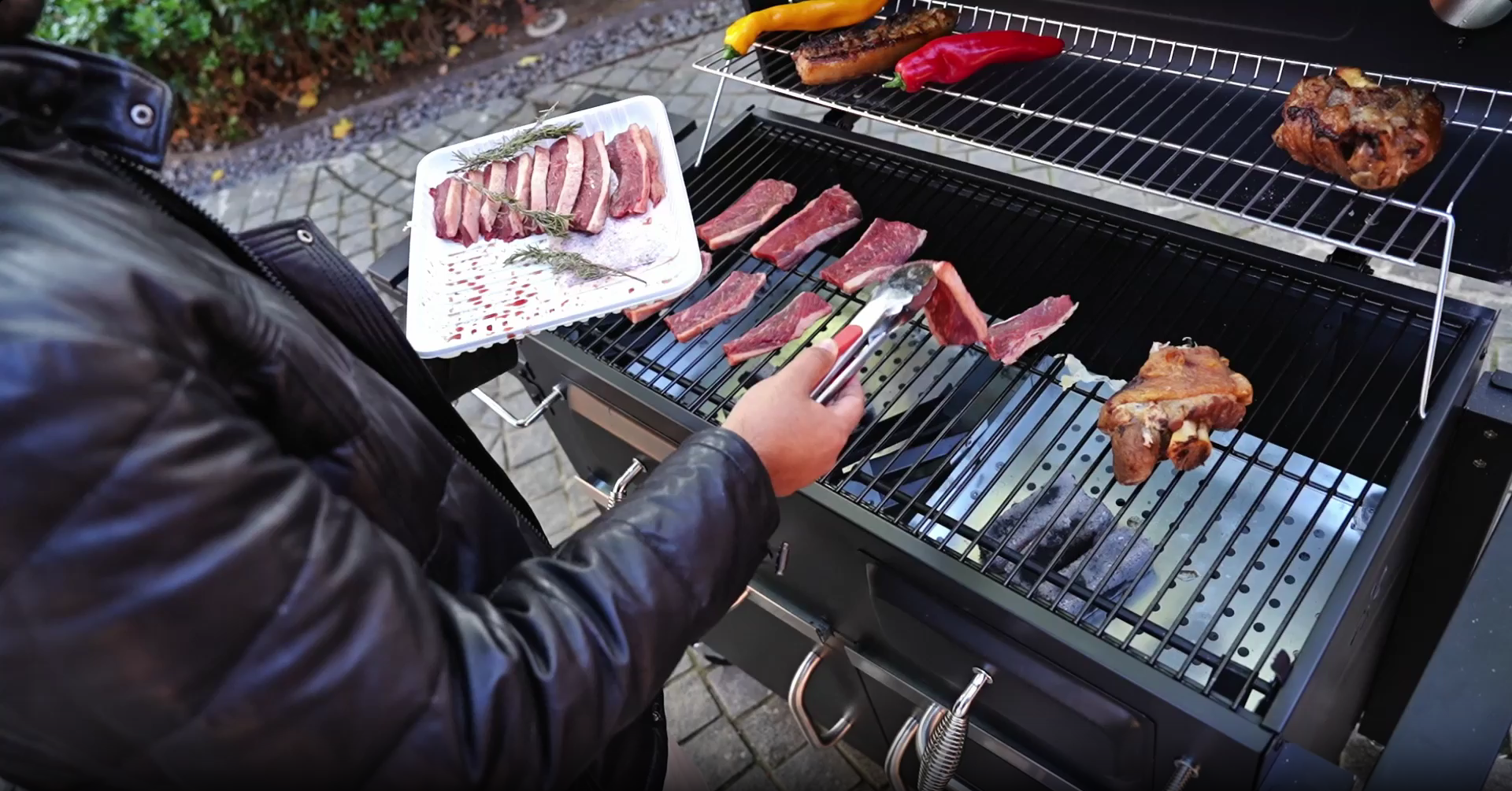 thumbnail video image 2 of SIXDAY Extra Large Charcoal Grill with Dual Adjustable Charcoal Trays, 3 Enamel Cooking Grates, Chrome Warming Rack, 4 Wheels & Foldable Side Tables, Outdoor BBQ Smoker, 2 of 7