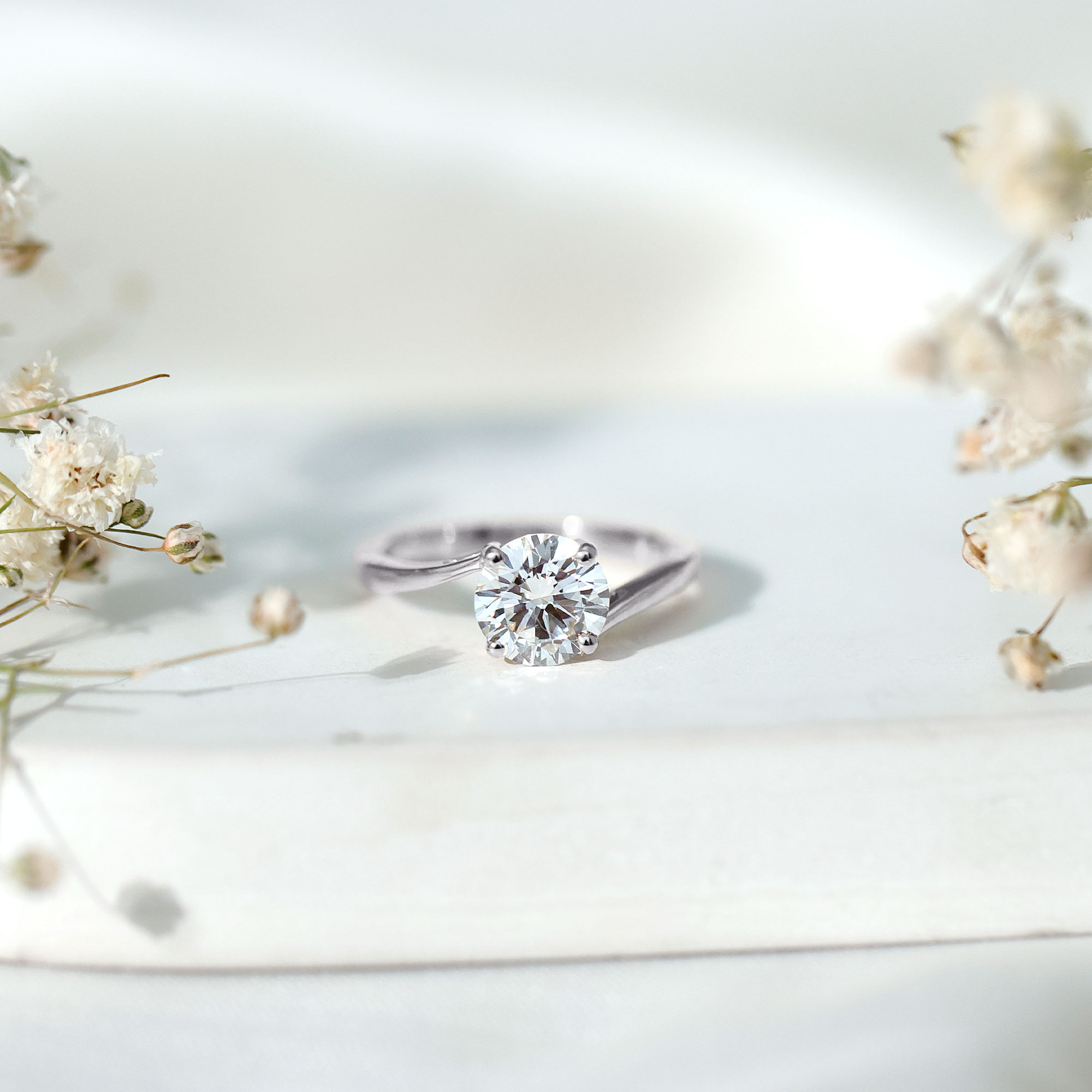 thumbnail video image 2 of Rosec Jewels Round Moissanite Solitaire Engagement Ring 1 Carat - 7 mm - Bypass Ring - D-VS1 Quality Certified, 10K White Gold, US 5.00, 2 of 9