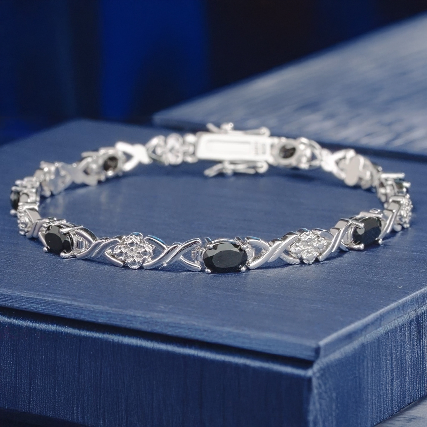 thumbnail video image 2 of Gem Stone King 925 Sterling Silver Black Onyx Tennis Bracelet for Women (3.20 Cttw, Gemstone December Birthstone, Oval 6X4MM, 7 inch), 2 of 6