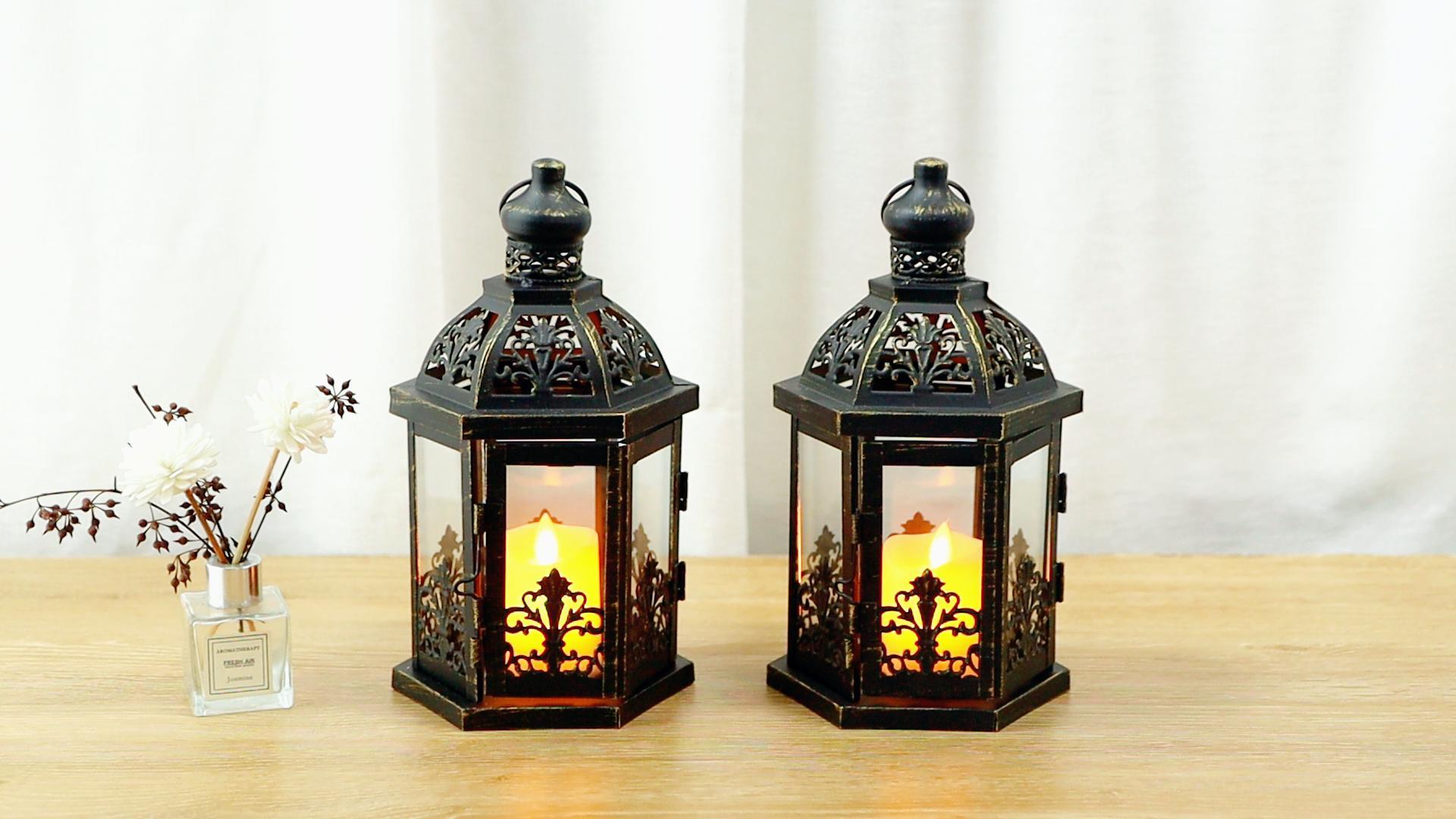 thumbnail video image 2 of JHY DESIGN Candle Lantern 2 Candle Brushed Metal Hollow Christmas Pillar Candles Candle Lantern, Set of 2, 2 of 7