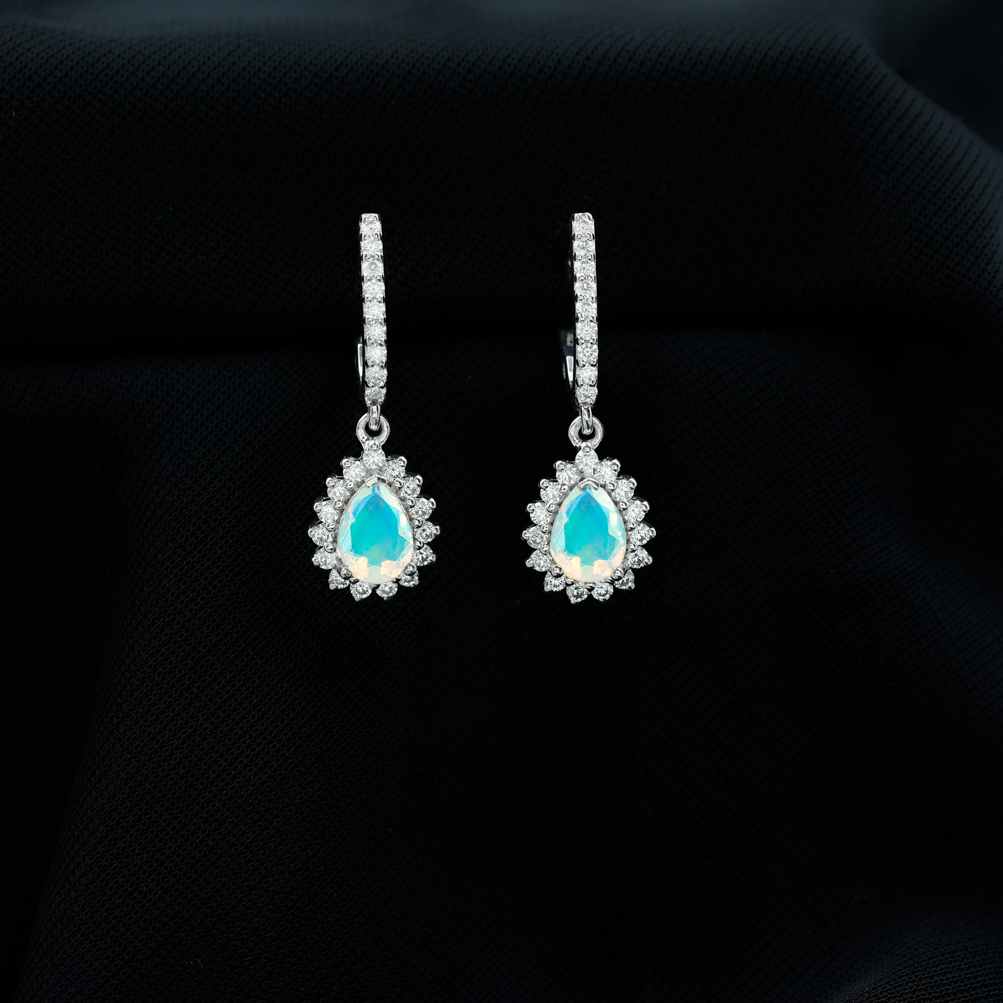 thumbnail video image 2 of Rosec Jewels Ethiopian Opal Drop Earrings with Moissanite (AAA Quality) 5x7 mm Teardrop Opal Bridal Earrings, 10K White Gold, 2 of 10