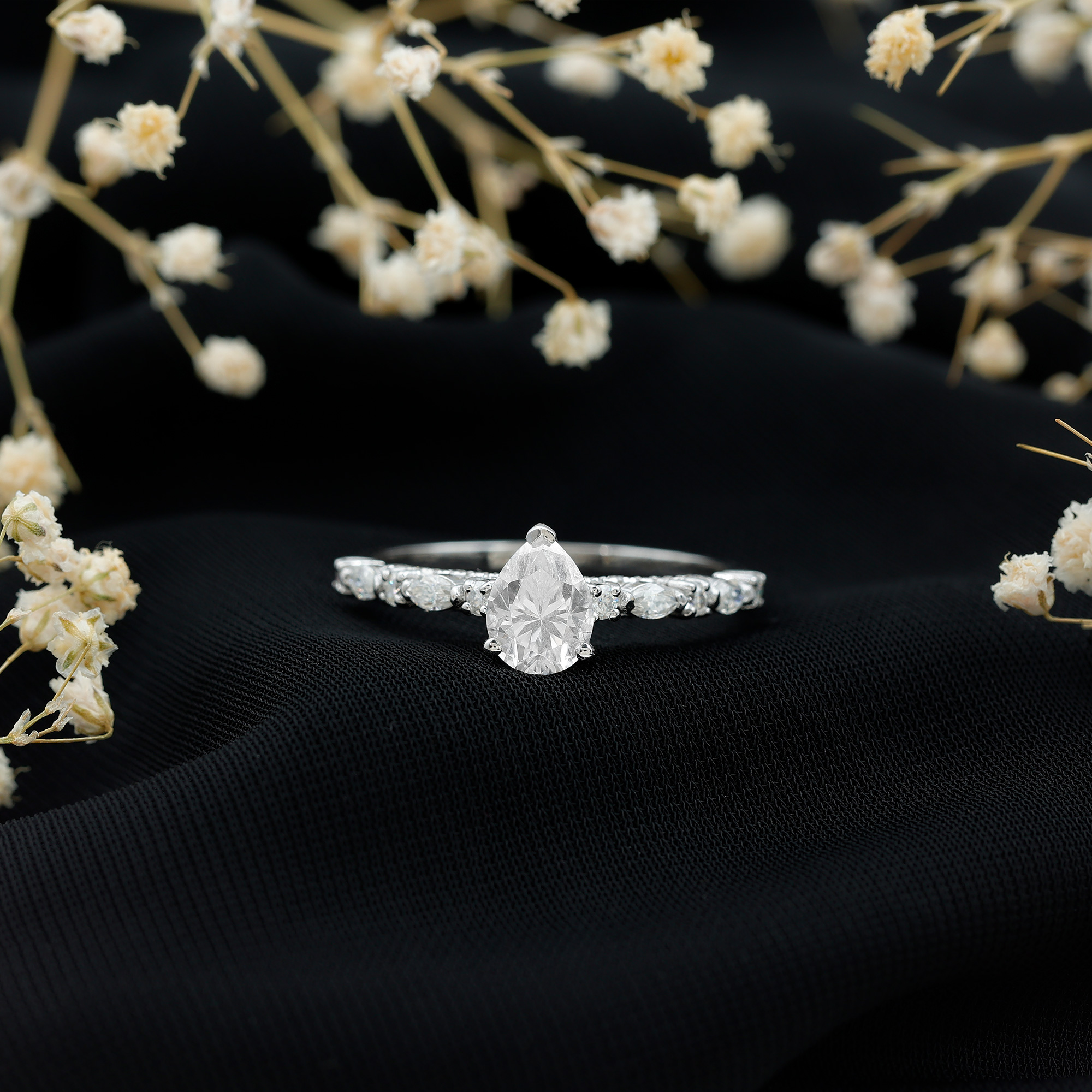 thumbnail video image 2 of Rosec Jewels Pear Shaped Moissanite Solitaire Engagement Ring for Women - 1 Ct - 6X8 mm - D-VS1 Grade, 18K White Gold, US 6.50, 2 of 9