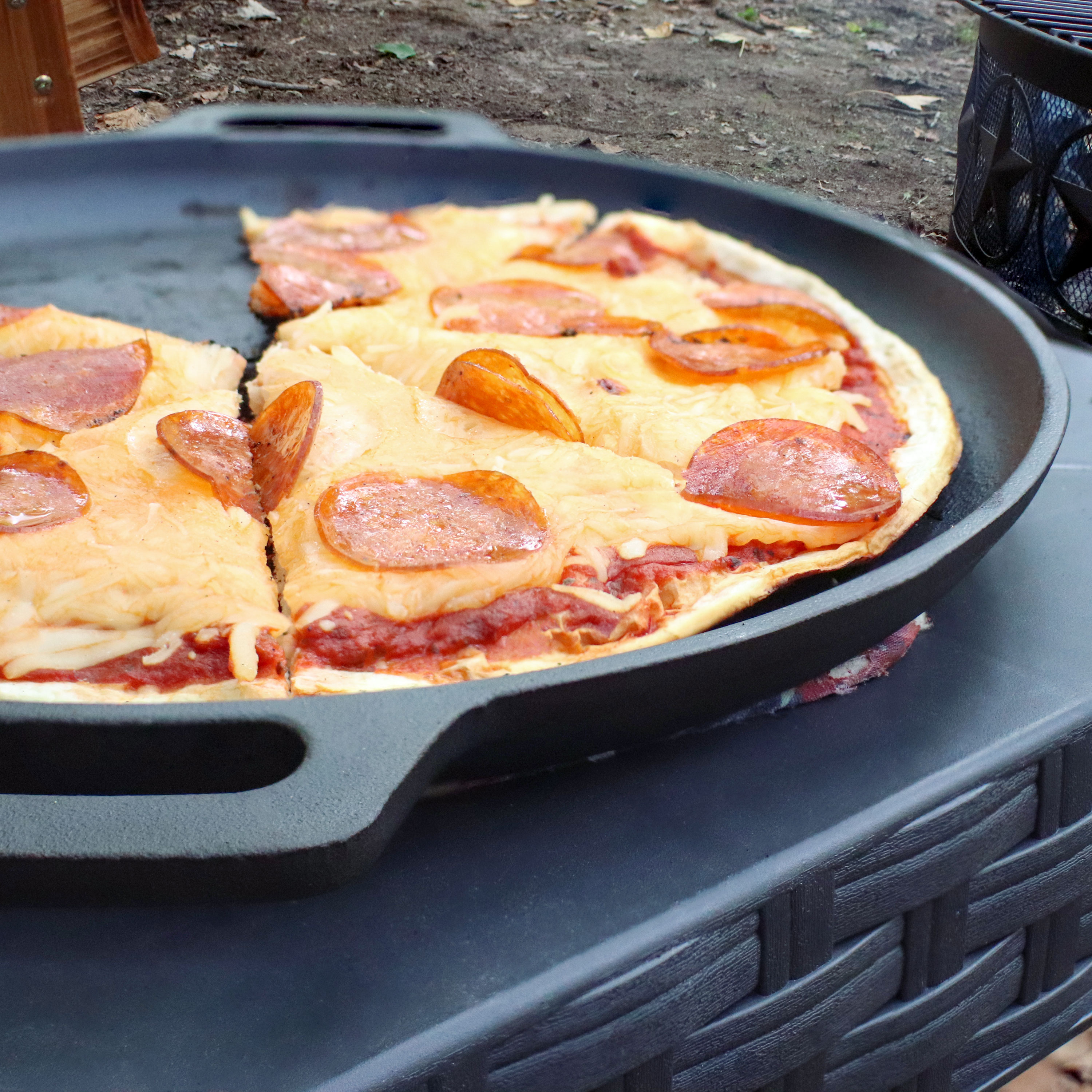 thumbnail video image 2 of Sunnydaze Pre-Seasoned Round Cast Iron Griddle/Pizza Pan with Handles, 13.75", 2 of 7