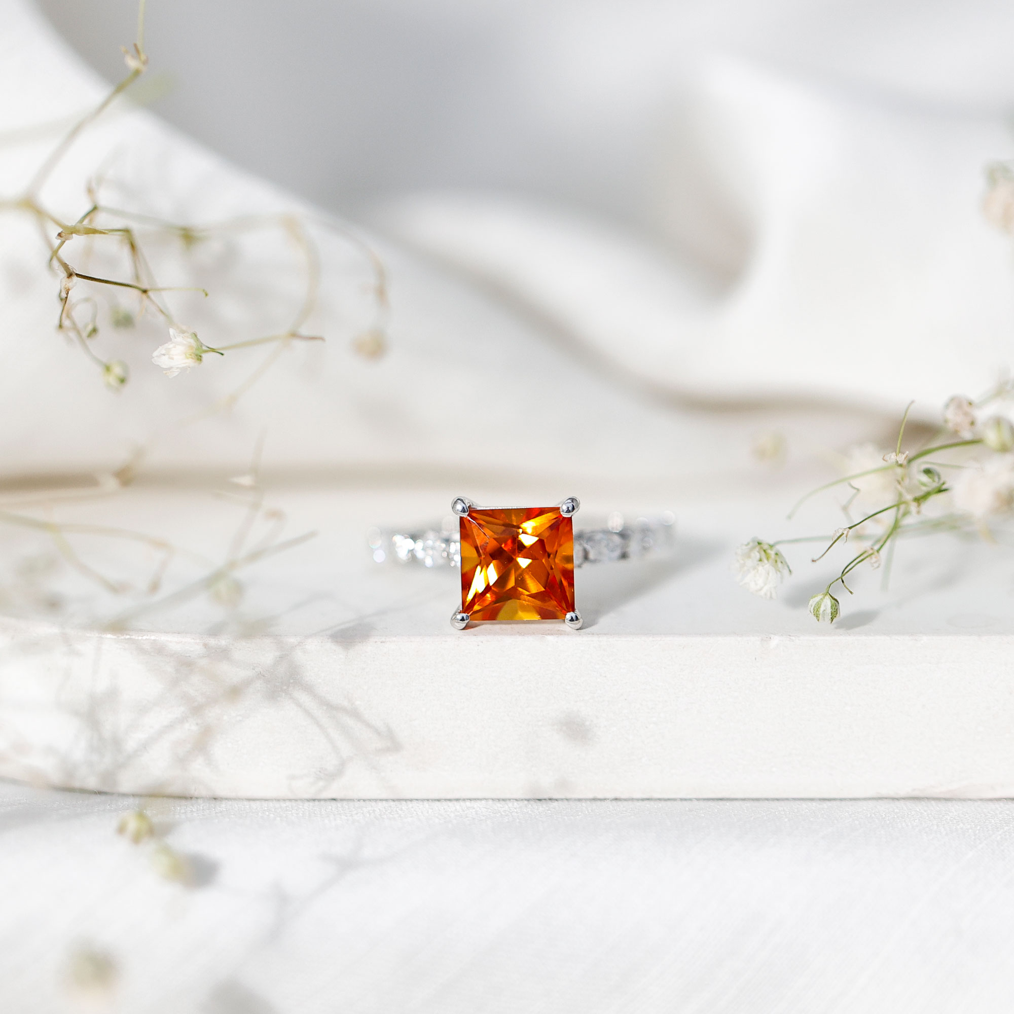 thumbnail video image 2 of Solitaire Lab Grown Orange Sapphire Ring with Moissanite - 2 Carat Princess Cut Sapphire Ring, 18K White Gold, US 8.50, 2 of 8