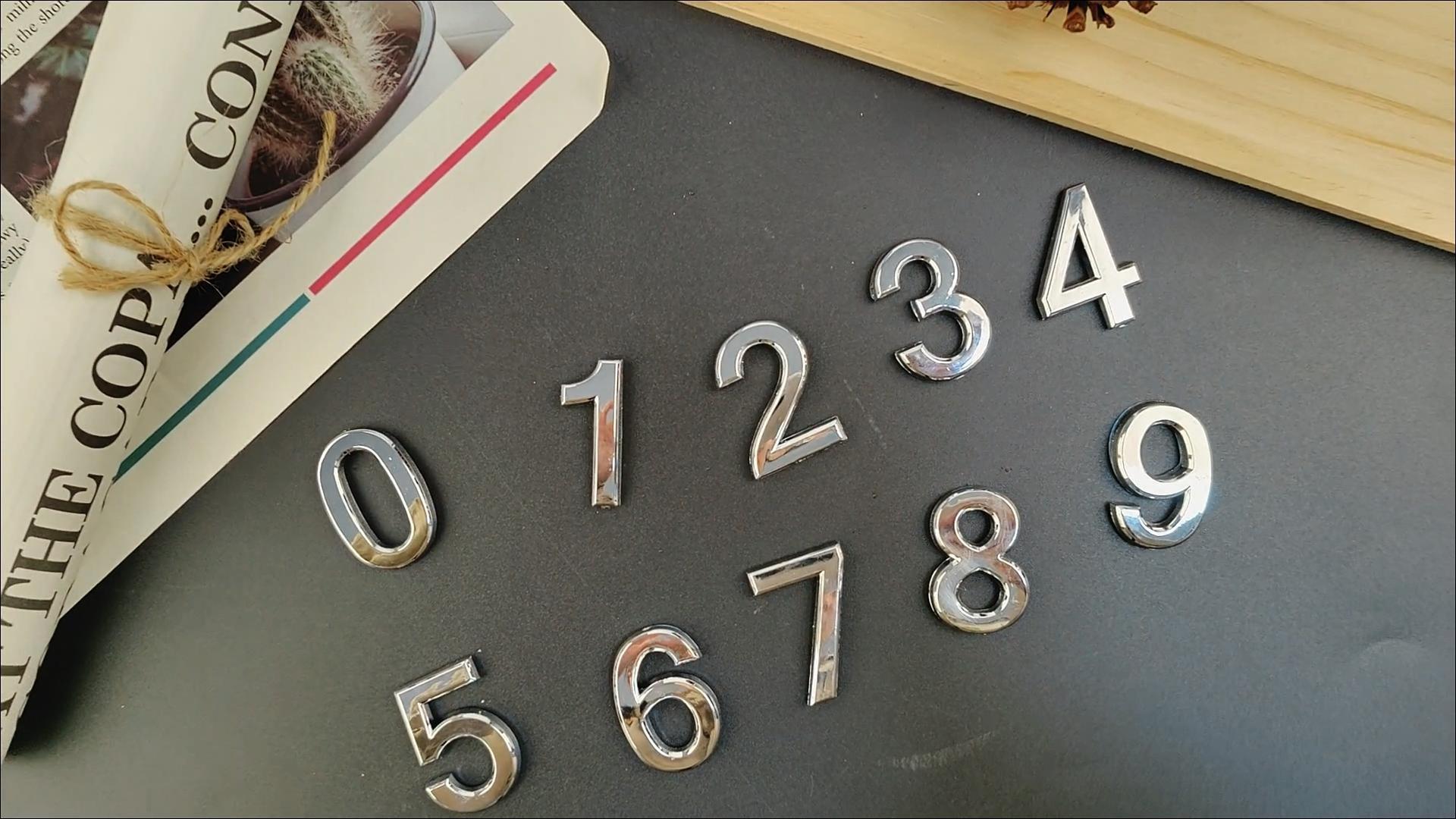 thumbnail video image 2 of thovorrnl 10 Pcs 3D Mailbox Numbers, Silver Plastic 0-9 Self Adhesive Door House Numbers Stickers for Home, Apartment, Hotel Room, Mailbox Signs, 2 of 8