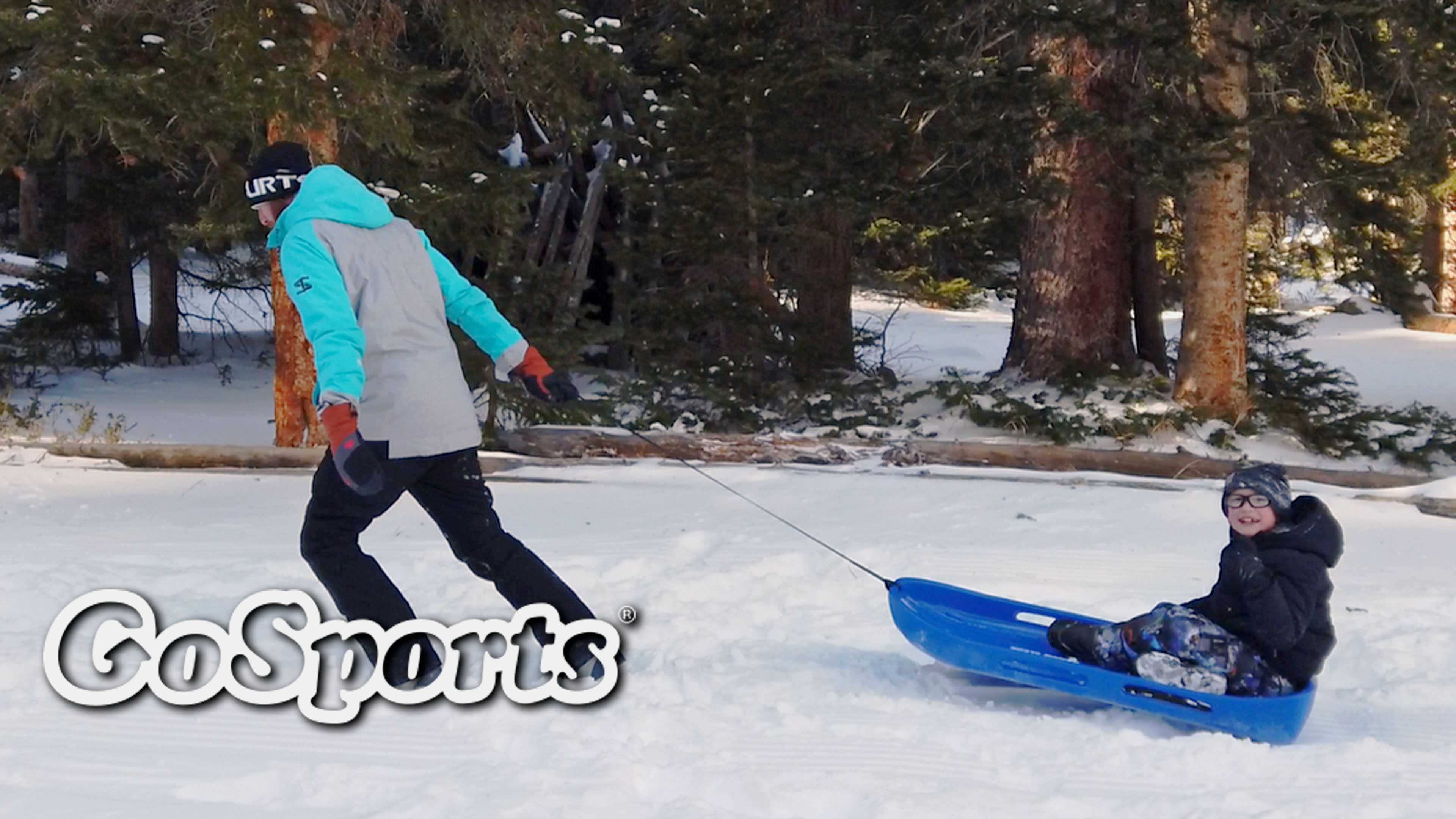 thumbnail video image 2 of GoSports 2 Person Premium Snow Sled with Double Walled Construction, Pull Strap and Padded Seat - Blue, 2 of 7