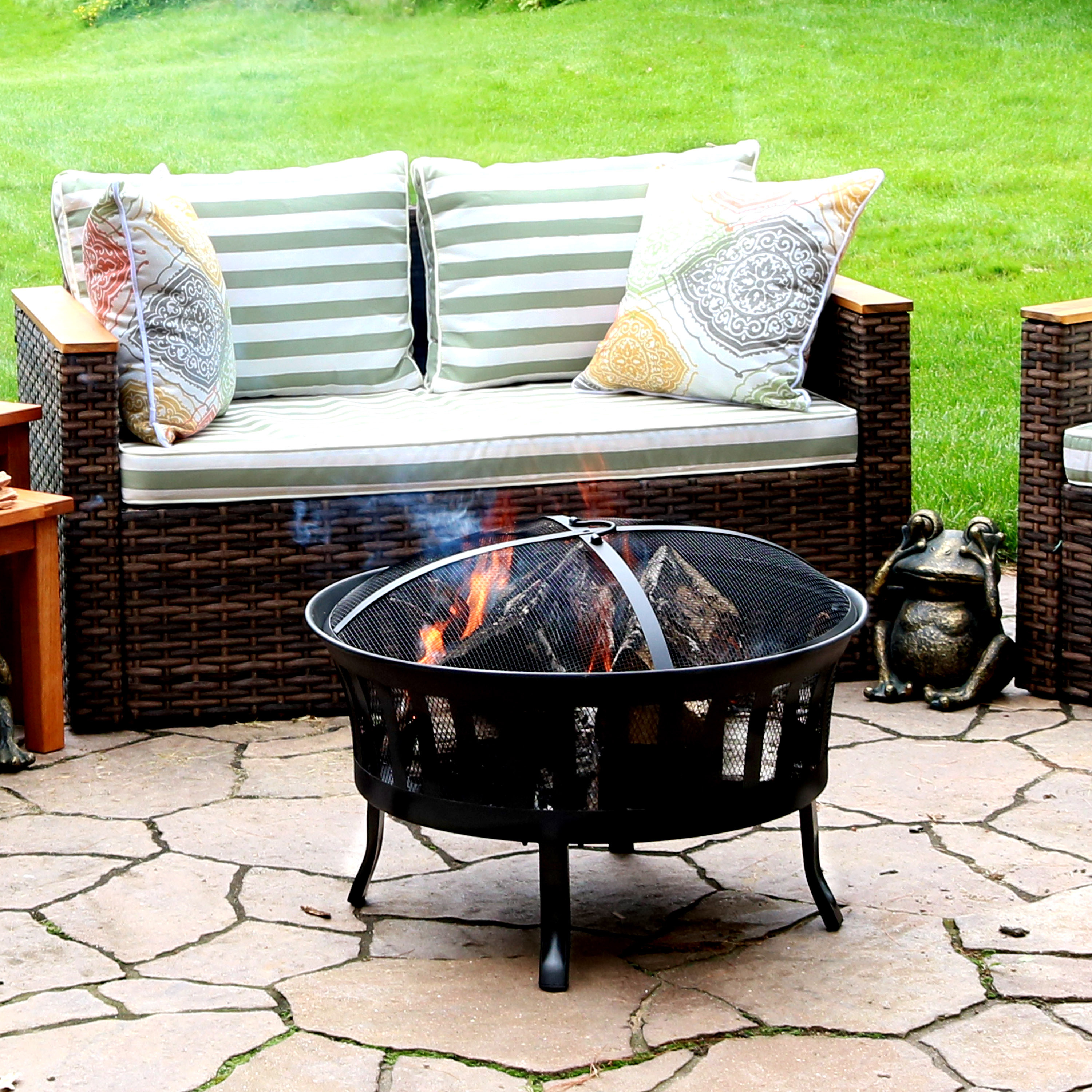 thumbnail video image 2 of Sunnydaze 25" Round Wood-Burning Black Finish Steel Fire Pit with Mesh Stripe Cutouts, 2 of 8