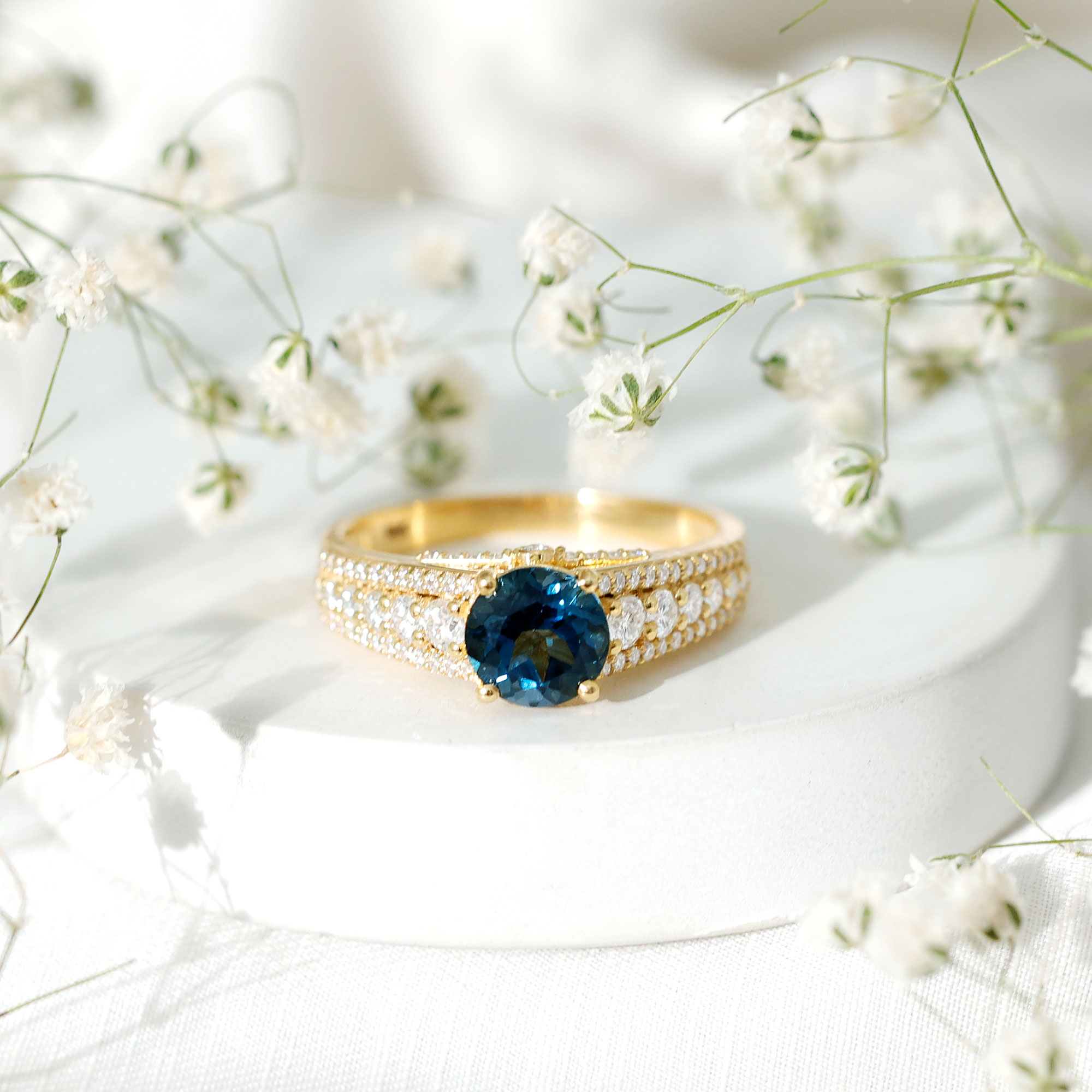 thumbnail video image 2 of Rosec Jewels - Natural London Blue Topaz Engagement Ring with Moissanite Side Stones - 8 mm Round Ring - AAA Quality, 18K Yellow Gold, US 8.50, 2 of 9
