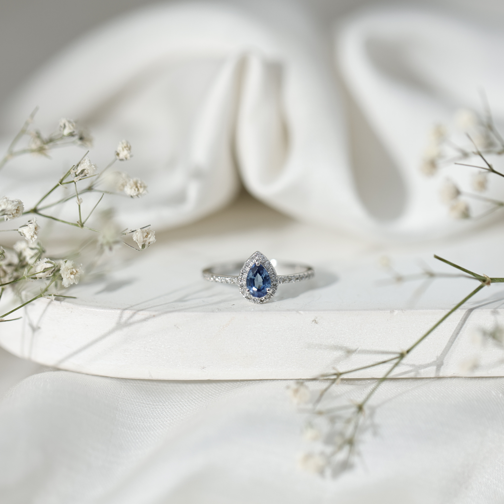 thumbnail video image 2 of Rosec Jewels Natural Blue Sapphire Pear Shaped Engagement Ring with Halo - Blue Sapphire and Diamond Ring - 4X6 mm - AAA Grade, 18K White Gold, US 11.00, 2 of 8