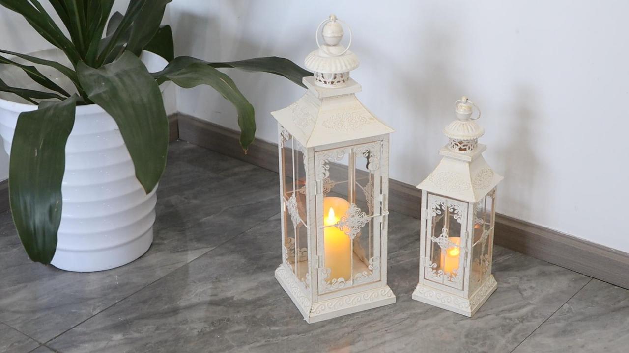 thumbnail video image 2 of Set of 2 Decorative Lanterns 21.5'' & 16" H Vintage Hanging Tower Lantern Metal Candle Holder with Tempered Glass for Indoor Outdoor Home Decor Parties Garden Wedding (White with Gold Brush), 2 of 7