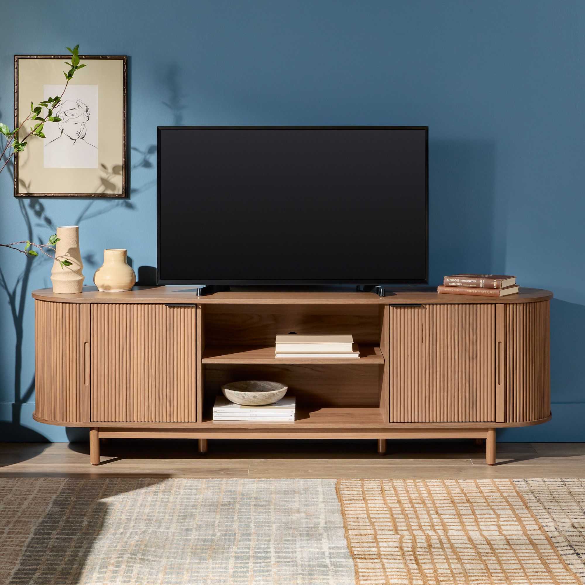 thumbnail video image 2 of Walker Edison Modern Reeded 70” TV Stand with Open Storage - Coastal Oak, 2 of 11