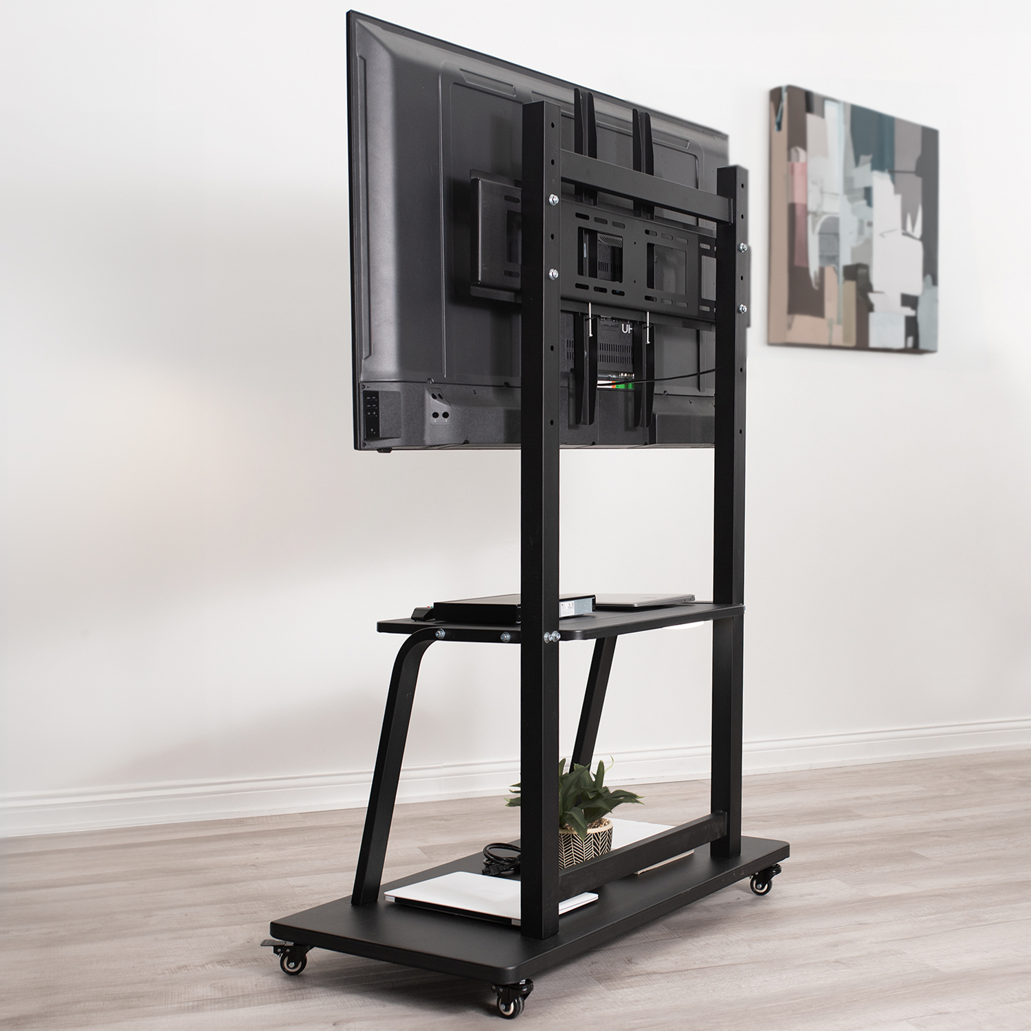 thumbnail video image 2 of VIVO Heavy Duty Steel Mobile TV Cart for 42" to 100" Screens w/ Metal AV Shelf, 2 of 9