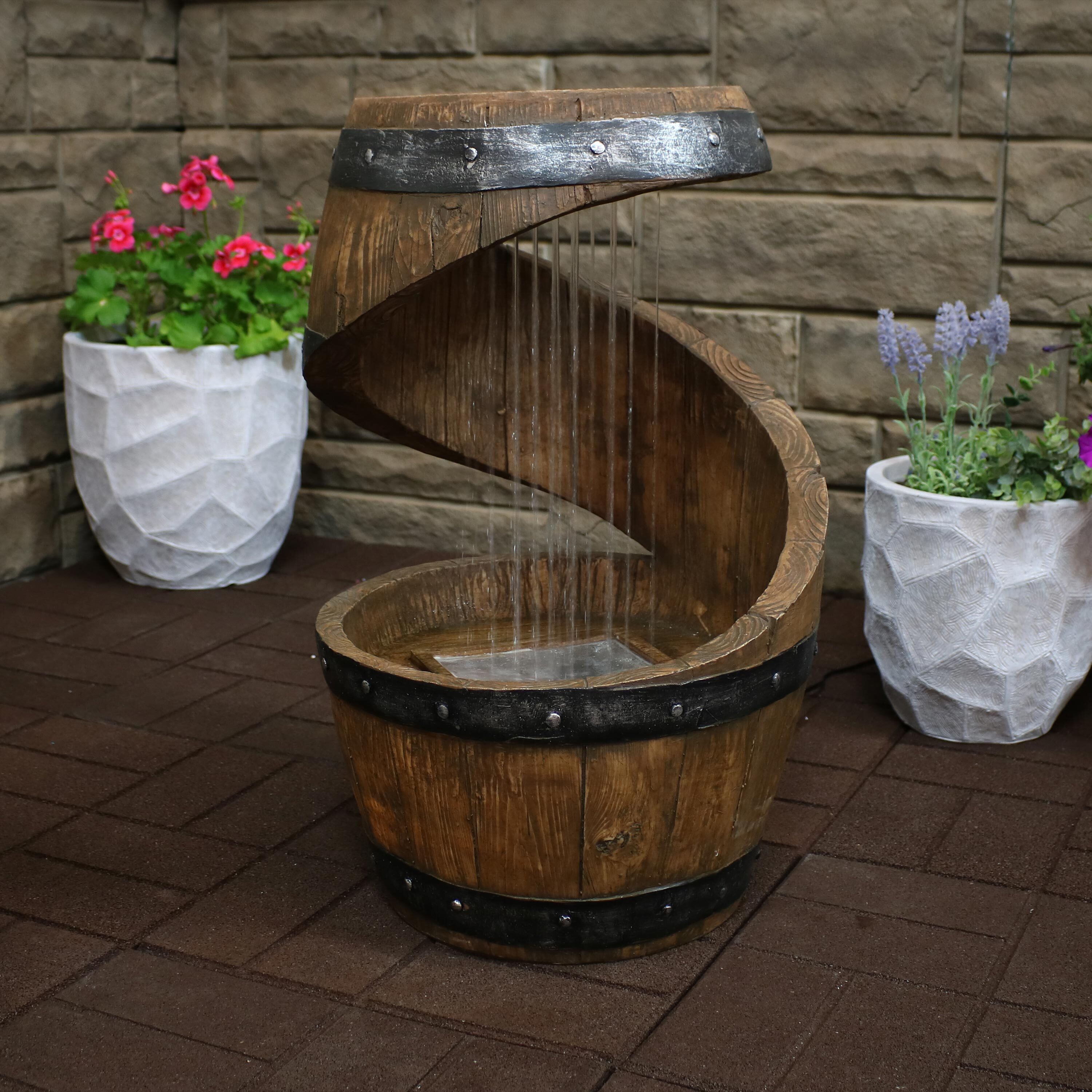 thumbnail video image 2 of Sunnydaze Spiraling Barrel Resin Outdoor Water Fountain with Light, 2 of 9