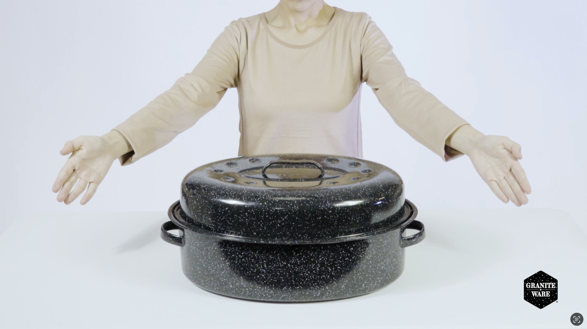 thumbnail video image 2 of Granite Ware 19 inch Oval Roaster with Lid, Oval Rack included (Speckled Black) - Design to accommodate up to 20 lb poultry/roast. Resists up to 932°F, 2 of 7