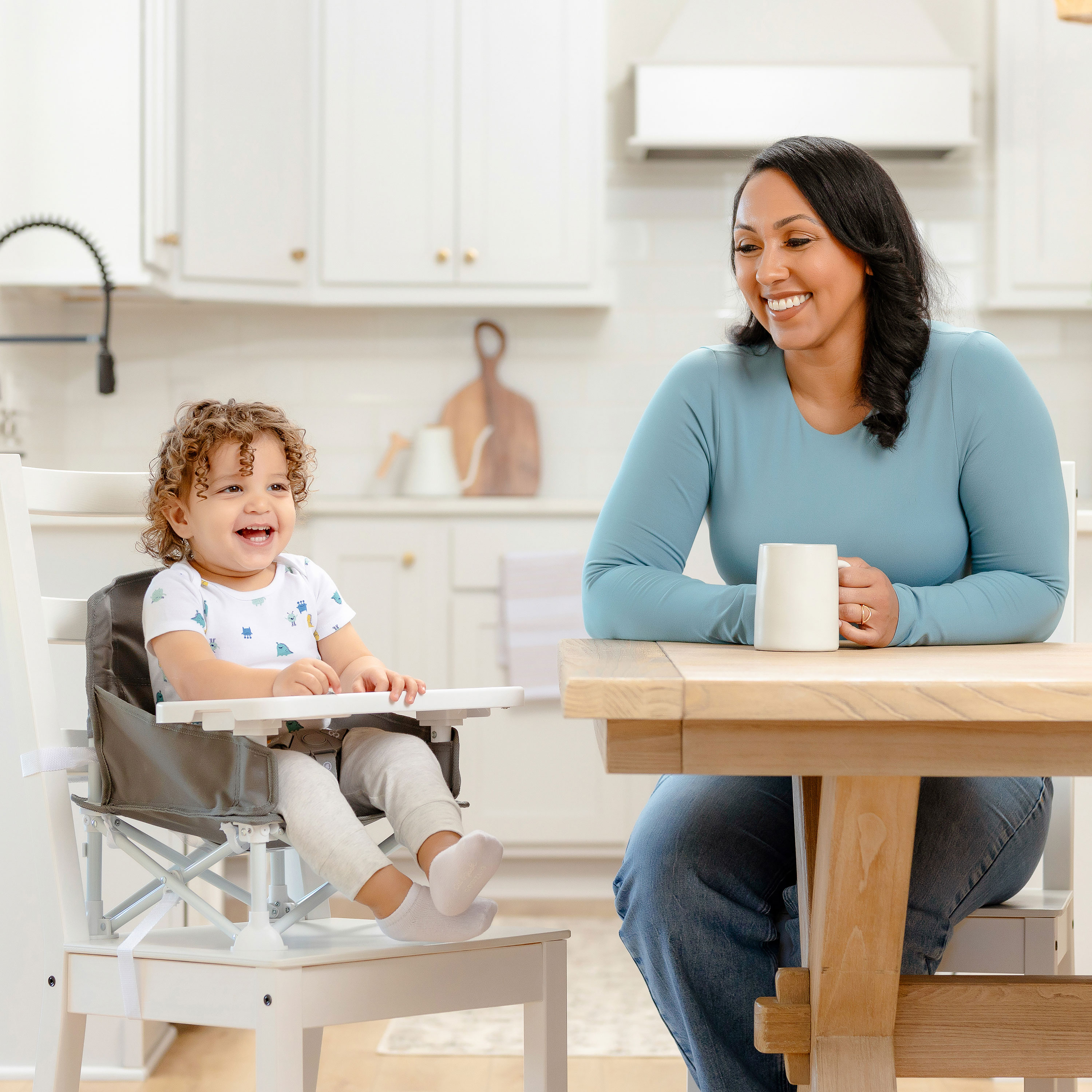 thumbnail video image 3 of Regalo My Chair Portable Multi-Functional Booster Seat with Attachable Tray, Adjustable for Ages 9 to 36 Months, Holds up to 37 lb, Gray, 3 of 15