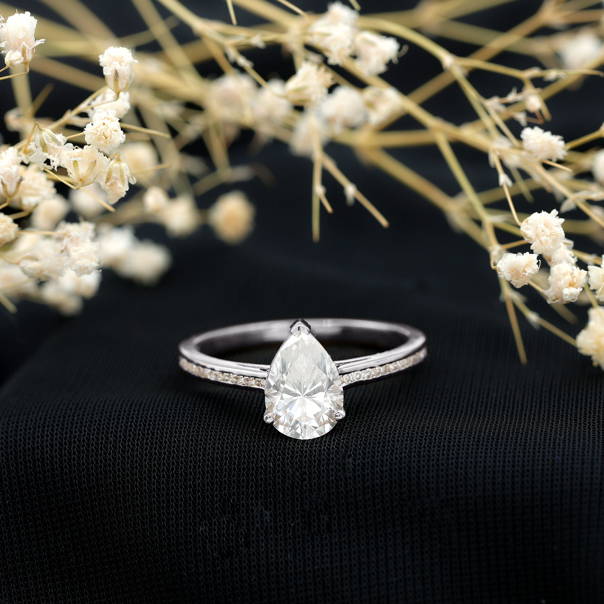 thumbnail video image 2 of Rosec Jewels Pear Moissanite Engagement Ring with Side Stones - 7X10 mm Teardrop Ring for Women - 2 Ct Ring - D-VS1 Grade, 10K Yellow Gold, US 7.00, 2 of 9