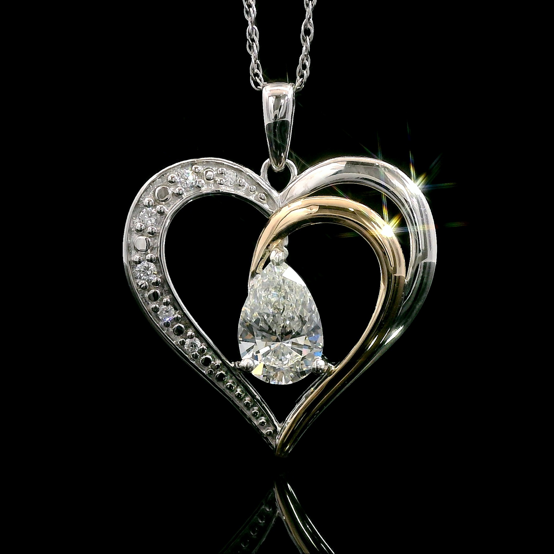 thumbnail video image 2 of 925 Sterling Silver and 10K Yellow Gold Swiss Blue Topaz and White Lab Grown Diamond Heart Shape Pendant Necklace for Women By Keren Hanan (1.34 Cttw, Pear Shaped 8X6MM, with 18 inch Chain), 2 of 7