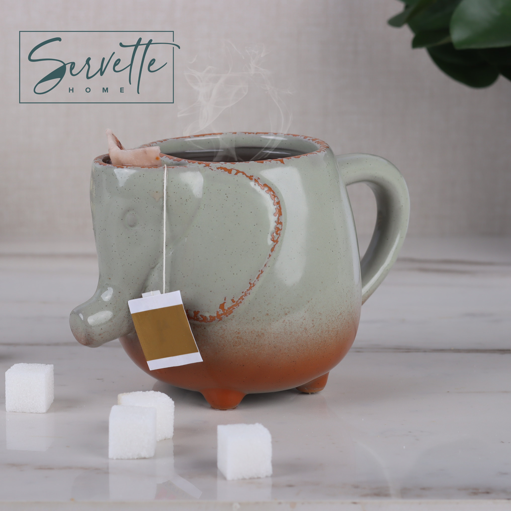 thumbnail video image 2 of Servette Home Ceramic Elephant Tea Mug with Tea Bag Holder 16oz, 2 of 6
