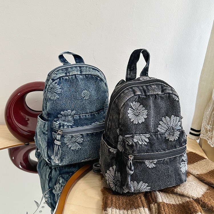 thumbnail video image 2 of Sunyuer Women Mini Denim Backpack, Vintage Daisy Floral Embossed Small Backpack, Lightweight Casual Daypack, Multi‑Pocket Compact Shoulder Bag for Travel Shopping Daily Use, 2 of 8