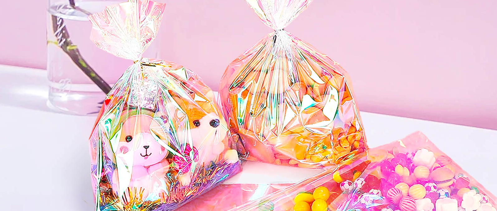thumbnail video image 2 of Cellophane Treat Bags, 6x12 Inch Iridescent Cellophane Bags with Thank You Stickers and Twist Ties, Celebrations Baby Showers Weddings Birthday Party Gift Wrapping(Pack of 100), 2 of 6