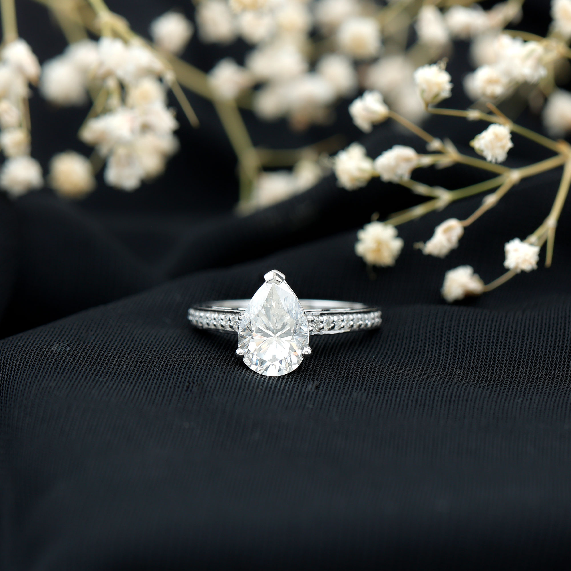 thumbnail video image 2 of Rosec Jewels Sterling Silver Moissanite Engagement Ring (2 Carat, 7X10 mm Pear Shape, D-VS1 Quality) - Teardrop Ring for Women, US 5.00, 2 of 9