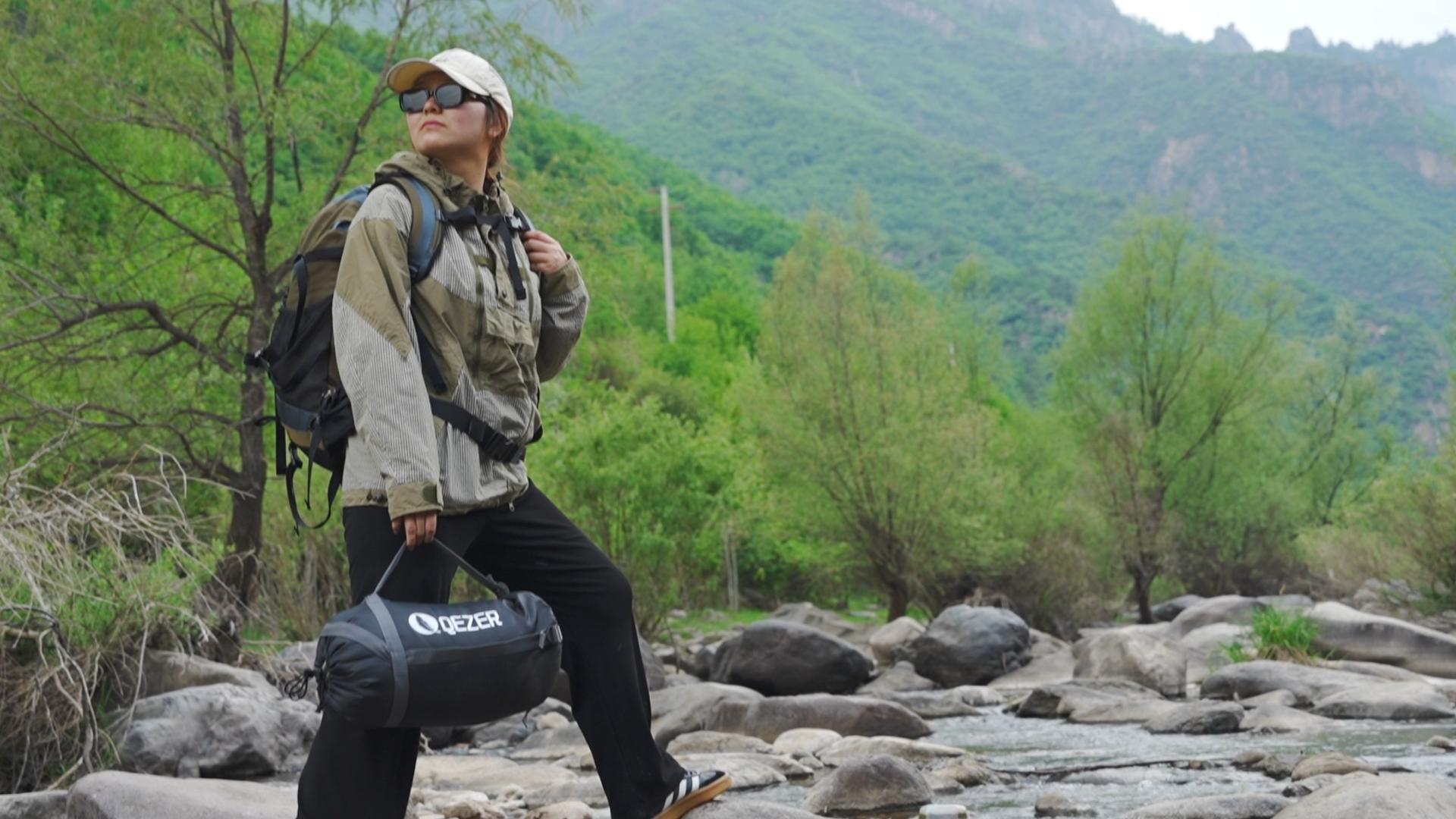 thumbnail video image 2 of QEZER Sleeping Bag for Adults, Water-Resistant Lightweight Camping Bag, 36°F-61°F, Hollow Fiber Fill, Full-Length Zipper, Machine Washable, Compression Sack, 86.6 x 31.5 in for Backpacking & Outdoor, 2 of 9