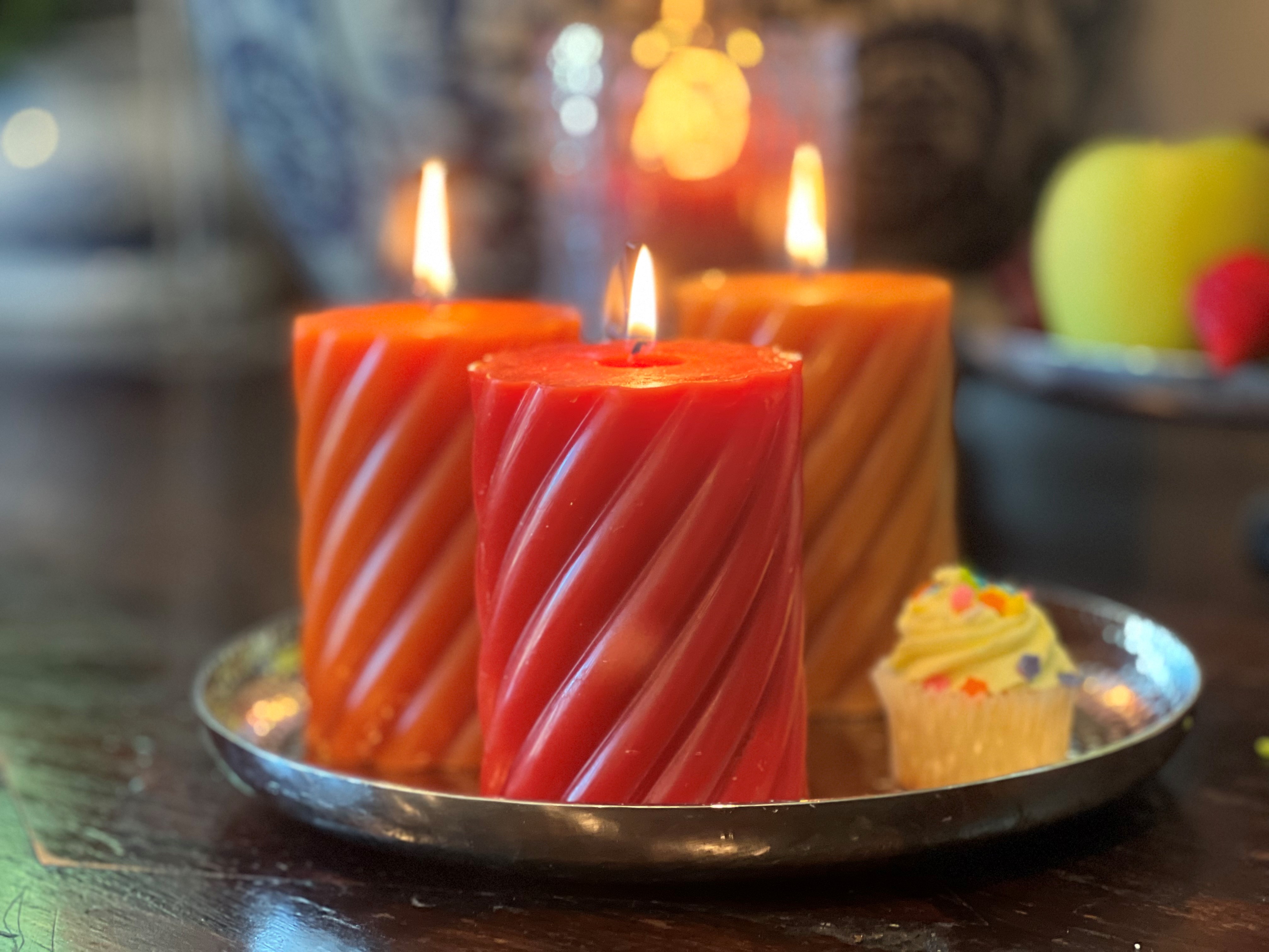 thumbnail video image 2 of Twist Pillar Candles, Set of 3, Orange, Tangerine and Amber, 45 Hours Burn Time, 4 Inches, 2 of 7
