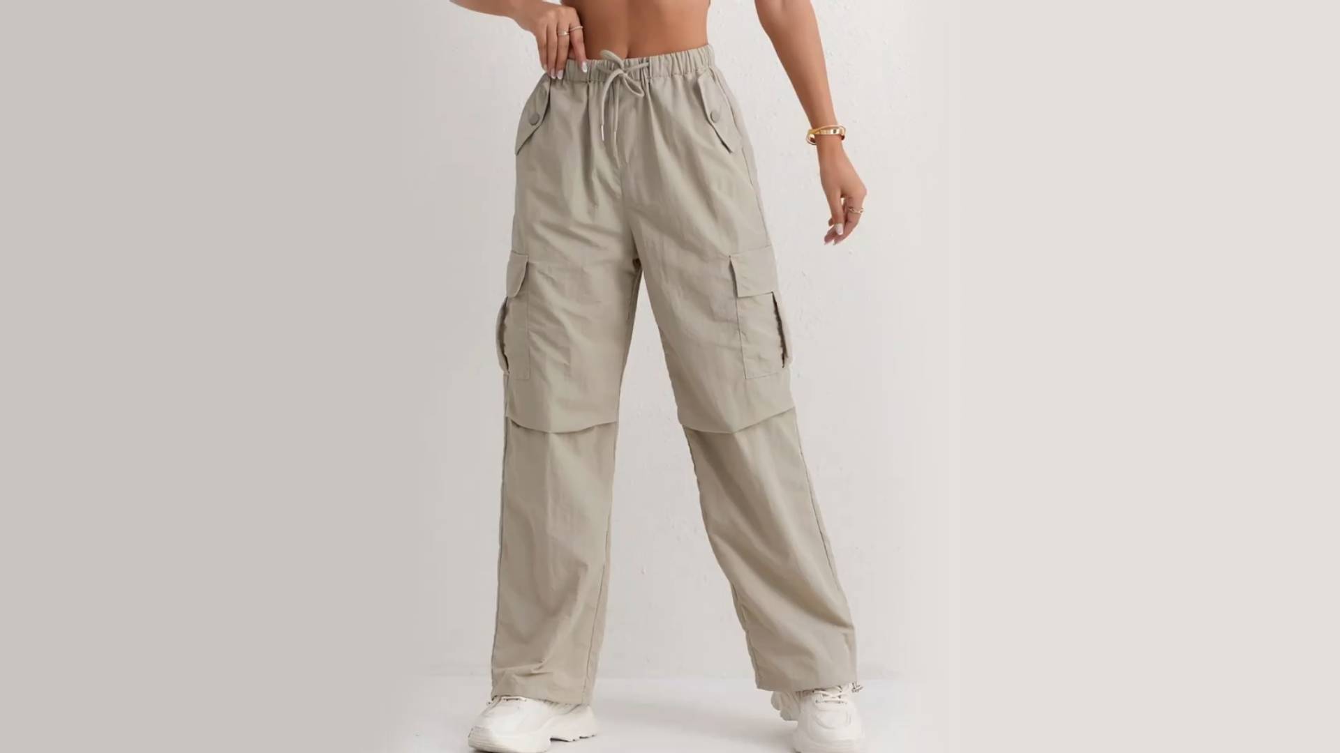 thumbnail video image 2 of Women's Quick-Dry Cargo Pants with Adjustable Drawstring Waist, Loose Fit Wide Leg Pockets for Outdoor Casual Wear Polyester, Ladies All-Season Comfort Vacation Elastic Waistband Quickdrying Pants, 2 of 5