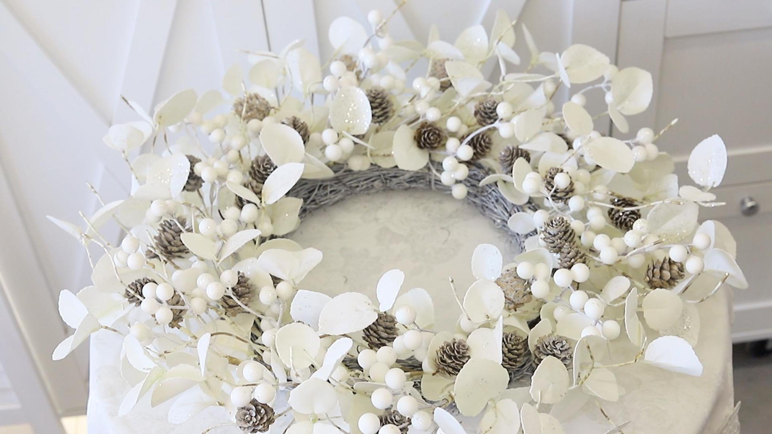 thumbnail video image 2 of White Pine Cone and Berry Eucalyptus Leaf Wreath - 22 Inch Handcrafted Winter Christmas Decoration, 2 of 8