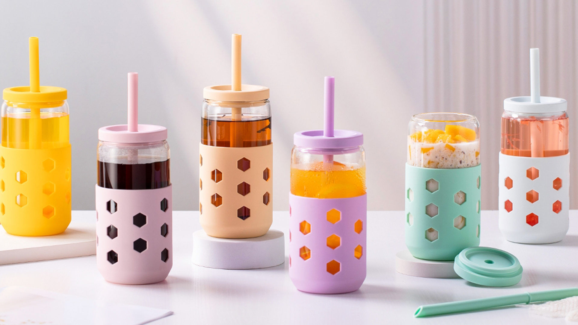 thumbnail video image 2 of Mrsdry Glass Cups with Silicone Lids and Straws (4 Pcs), 16oz Drinking Glasses Set with Silicone Sleeves for Coffee Bar Accessories Iced Coffee Cups with Lids, Glass Tumbler Reusable for Gifts, 2 of 12