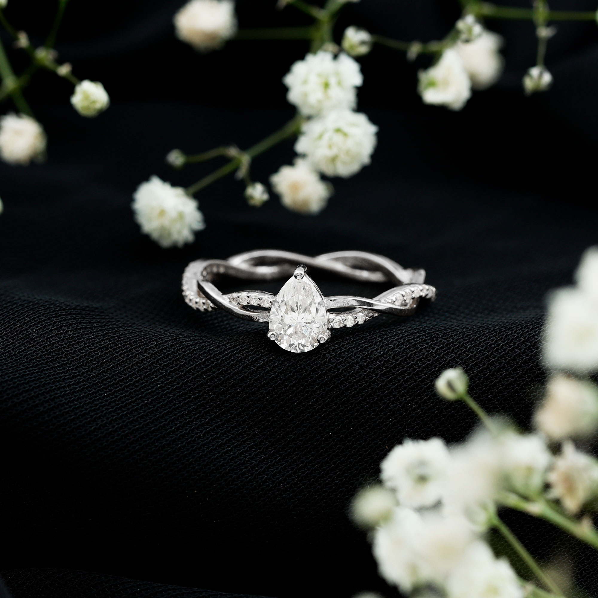 thumbnail video image 2 of Rosec Jewels Moissanite Pear Shape Engagement Ring for Women - 5X7 mm Moissanite Solitaire Ring - D-VS1 Grade Certified, 925 Sterling Silver, US 4.00, 2 of 8