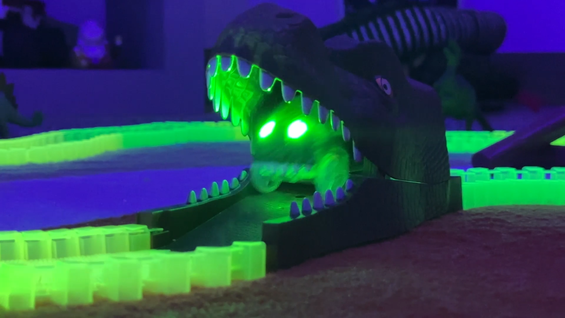 thumbnail video image 2 of JitteryGit Dinosaur Race Track Glowing Loop Toy Set - Kids Christmas Play Gift Idea - STEM Flexible Car Track for Boys & Girls Ages 3-8, 2 of 9