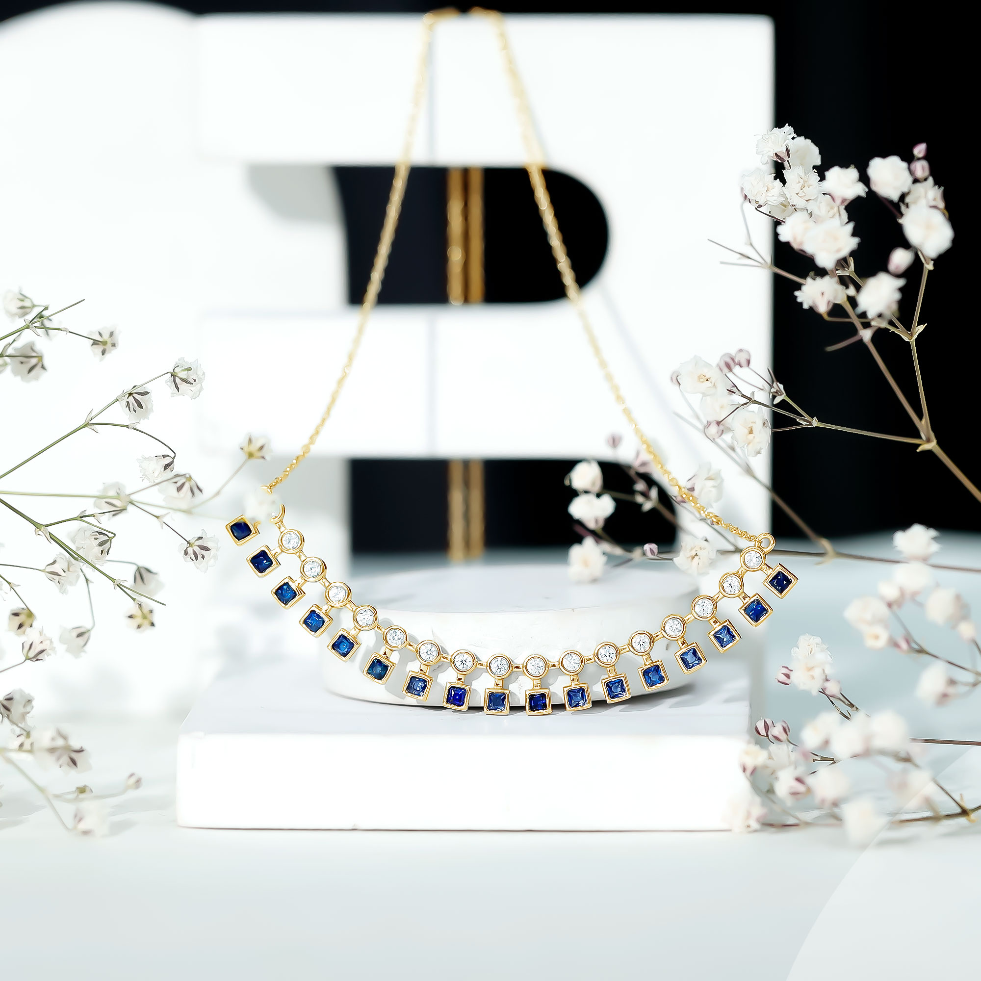 thumbnail video image 2 of Rosec Jewels Lab Grown Blue Sapphire Curved Bar Necklace - (AAAA Grade) Blue Sapphire and Moissanite Necklace - with Jewelry Box, 18K Yellow Gold, 2 of 8