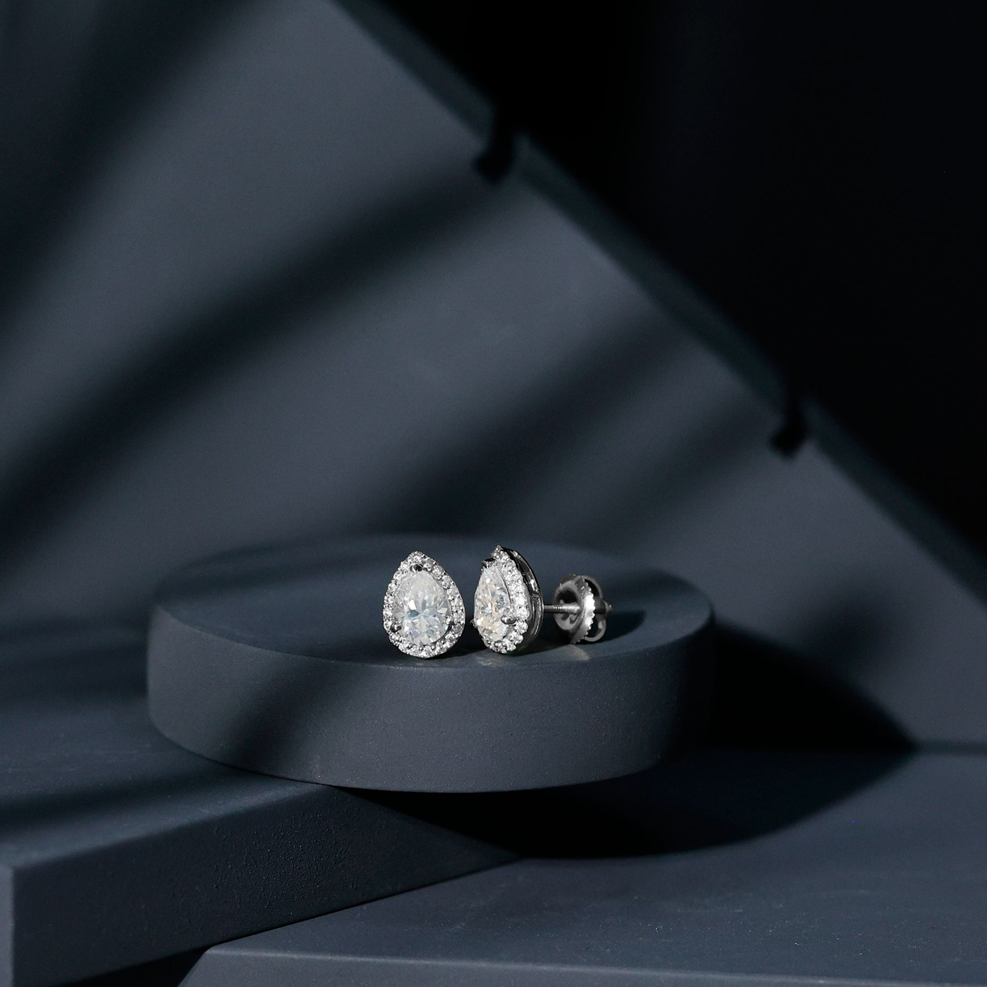 thumbnail video image 2 of Rosec Jewels Pear Shape Moissanite Halo Stud Earrings - D Color VS1 Clarity, 10K Yellow Gold, 2 of 9