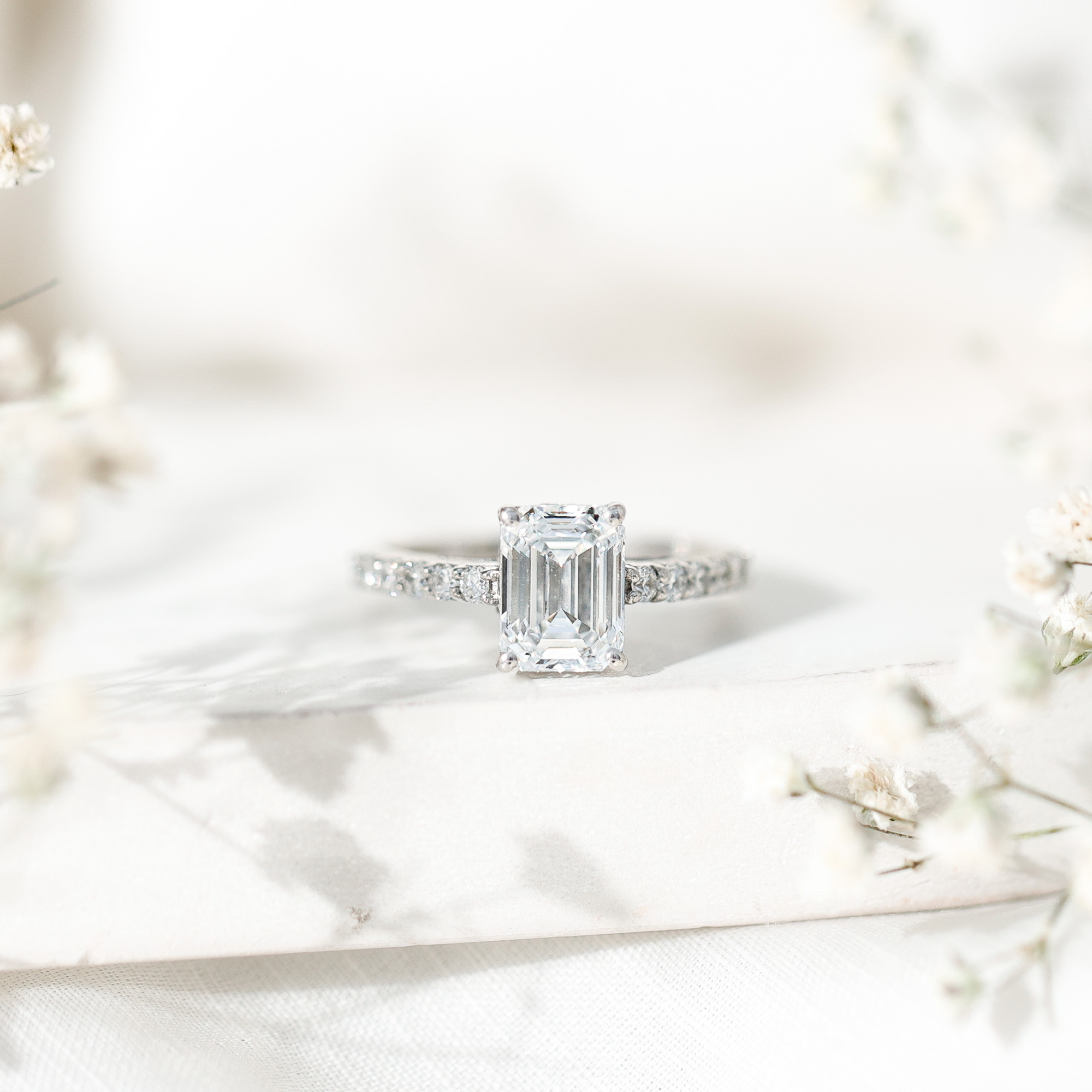 thumbnail video image 2 of Rosec Jewels Emerald Cut Moissanite Engagement Ring with Hidden Halo - 6X8 mm, 2 Ct, D-VS1 Grade, 18K Yellow Gold, US 8.00, 2 of 9