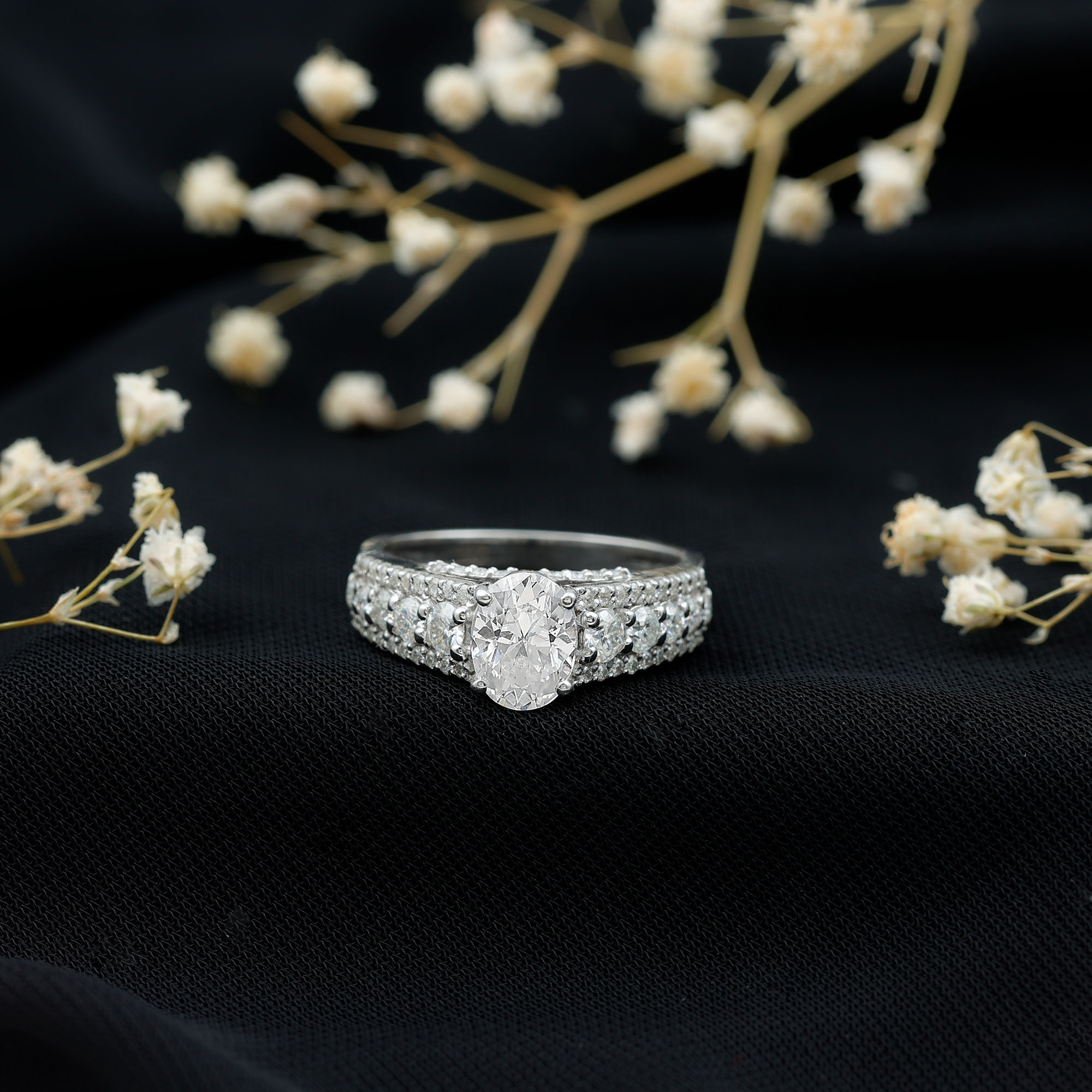 thumbnail video image 2 of Rosec Jewels Moissanite Oval Engagement Ring with Side Stones - 6X8 mm - Designer Ring - 1 Ct - D-VS1 Grade, 14K White Gold, US 3.50, 2 of 9