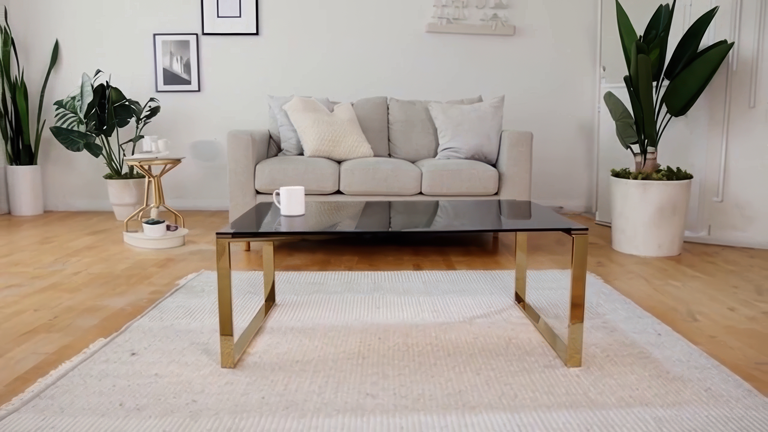thumbnail video image 2 of Cortesi Home Remini Coffee Table, Gold Metal and Black Glass, 2 of 7