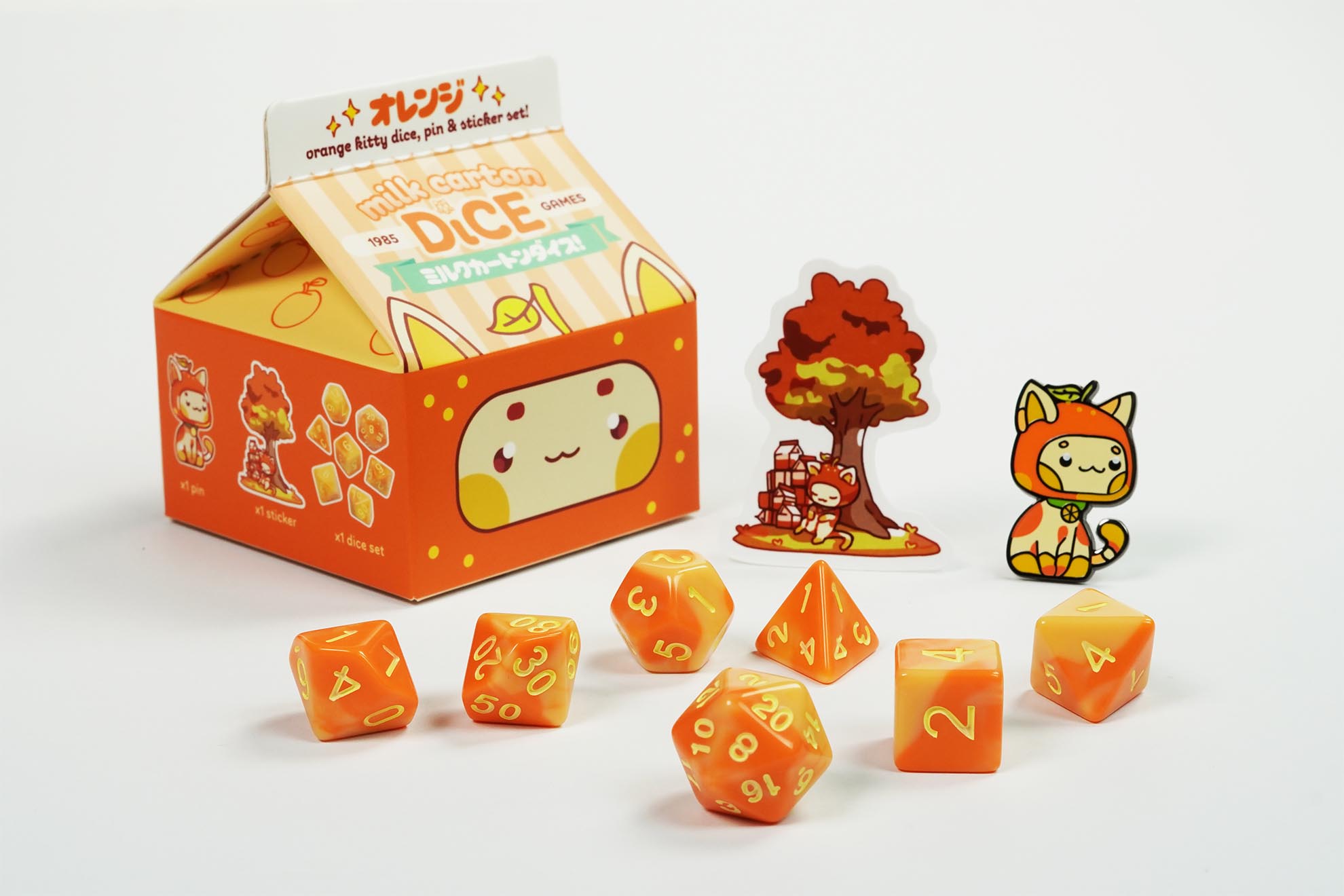 thumbnail video image 2 of 1985 Games Kawaii Cat Milk Carton Dice Set – Orange 7-Piece RPG Dice, 2 of 6