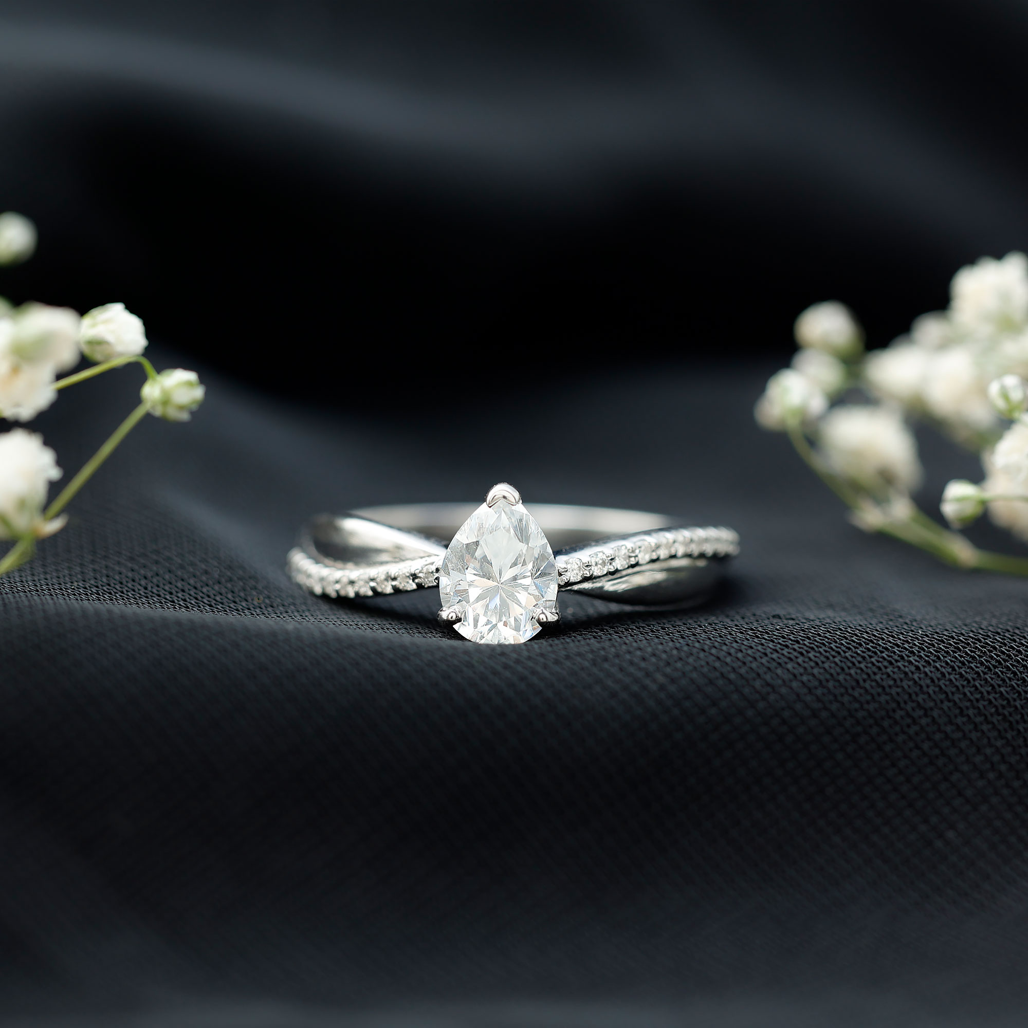 thumbnail video image 2 of Rosec Jewels Pear Shaped Moissanite Solitaire Engagement Ring for Women (1 Ct, 6X8 mm), 18K White Gold, US 10.00, 2 of 8