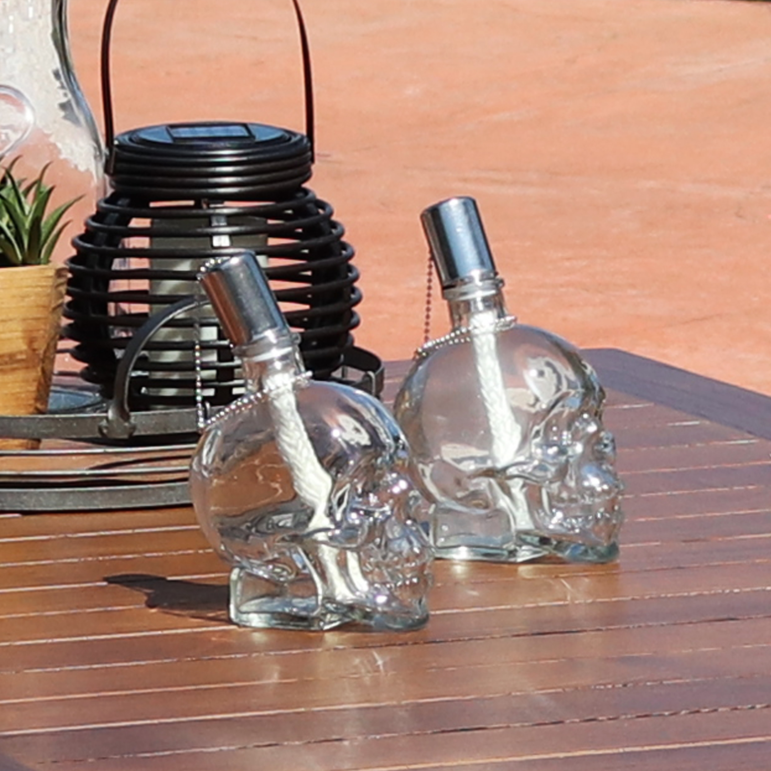thumbnail video image 2 of Sunnydaze Grinning Skull Black Outdoor Tabletop Torch Set (4 Count), 2 of 10