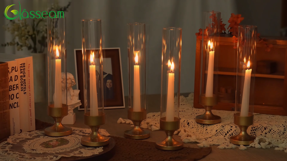 thumbnail video image 2 of Glasseam Set of 2 Gold Metal Glass Hurricane Candle Holders: Windproof Taper Candle Sticks for Wedding Dinner Table Decor (9.7" Glass Cylinder Matte Gold Base), 2 of 9