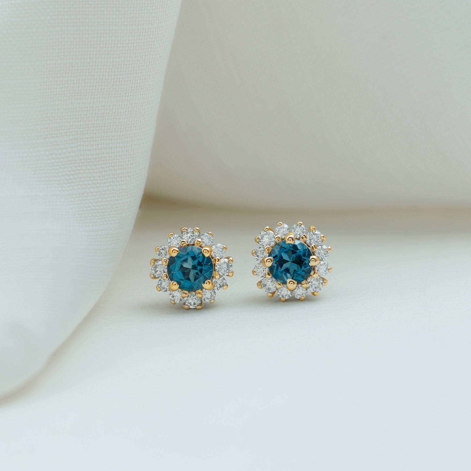 thumbnail video image 2 of Rosec Jewels 3/4 CT London Blue Topaz and Diamond Halo Stud Earrings for Women, 925 Sterling Silver, 2 of 7