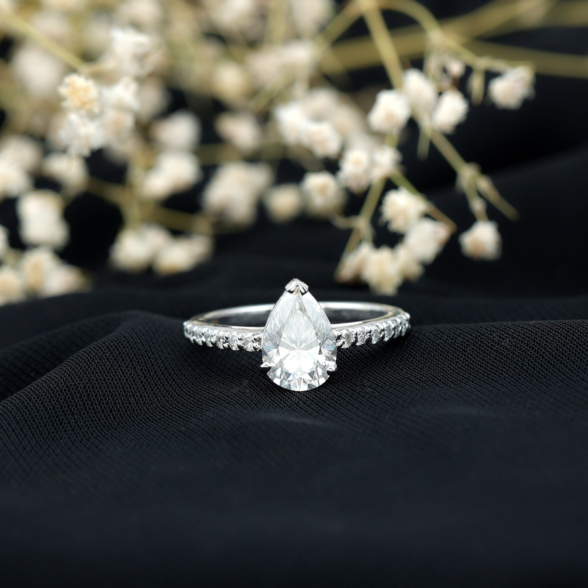 thumbnail video image 2 of Rosec Jewels Womens Moissanite Teardrop Engagement Ring with Side Stones - 2 Carat, 7X10 mm, D-VS1 Grade, 10K Yellow Gold, US 5.00, 2 of 7