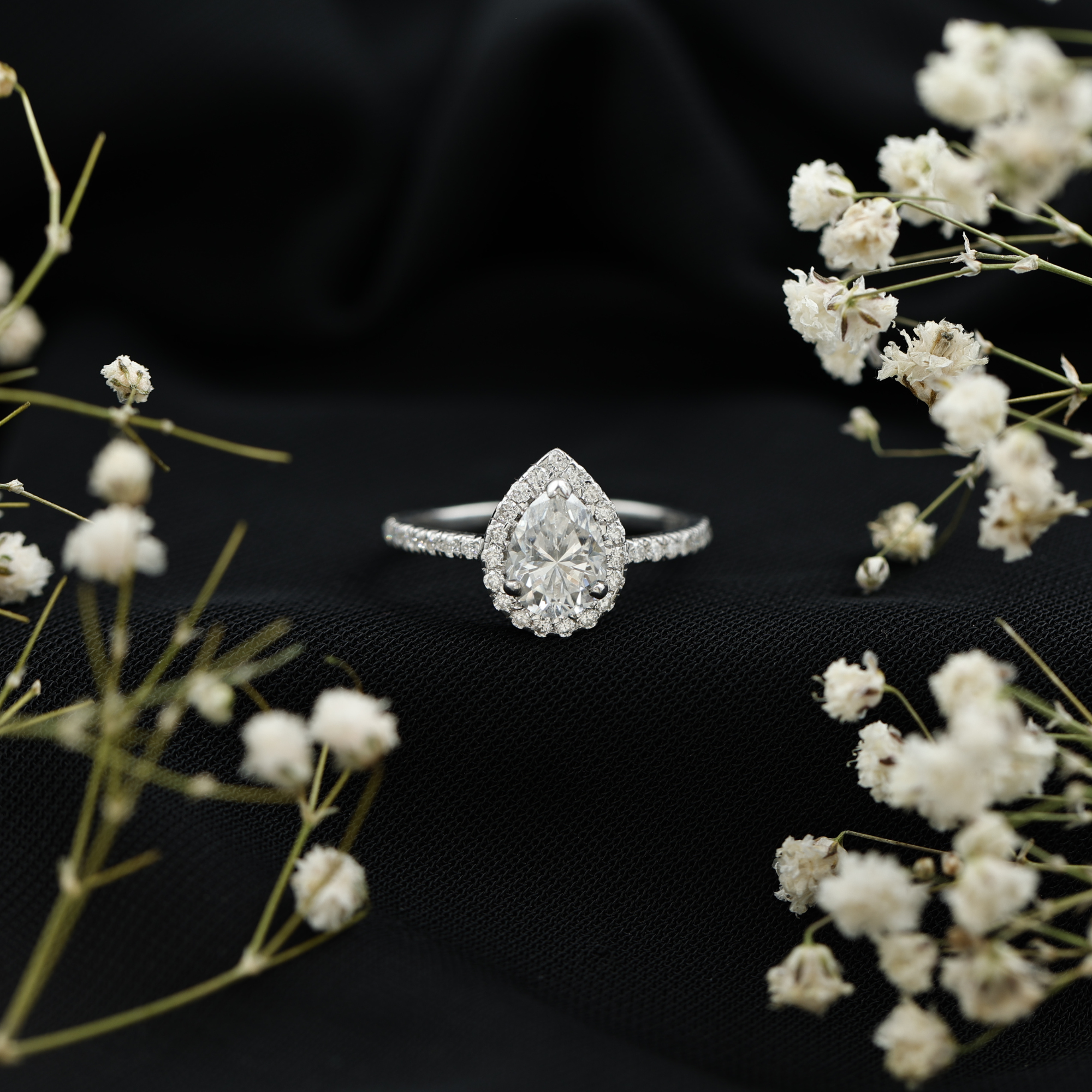 thumbnail video image 2 of Rosec Jewels Moissanite Teardrop Engagement Ring with Halo - 1 Ct - 6X8 mm Pear Shape - D-VS1 Quality, 925 Sterling Silver, US 10.50, 2 of 9